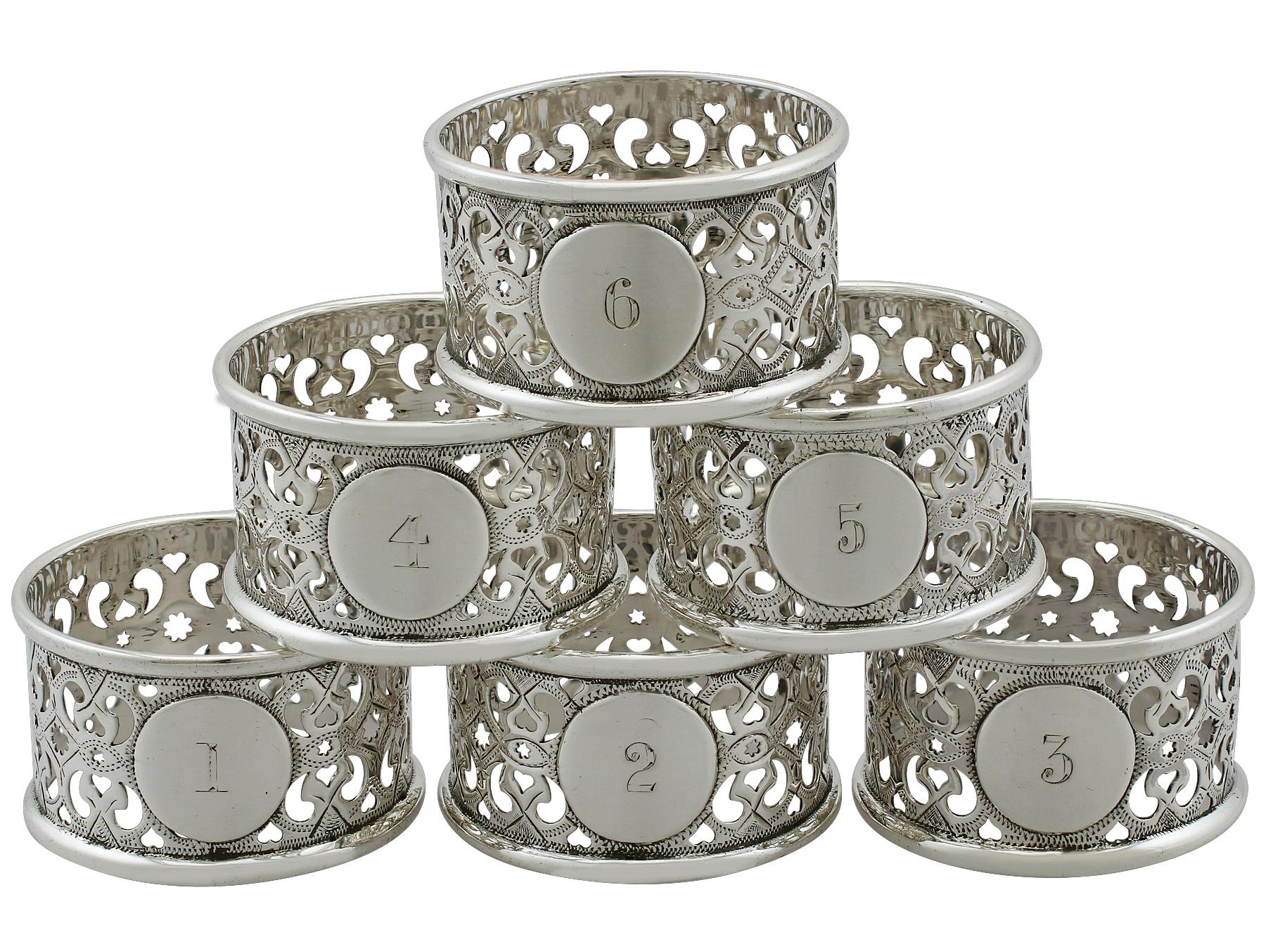 An exceptional, fine and impressive set of six numbered antique Victorian English sterling silver napkin rings, boxed, an addition to our dining silverware collection.

This exceptional set of antique Victorian napkin rings in sterling silver