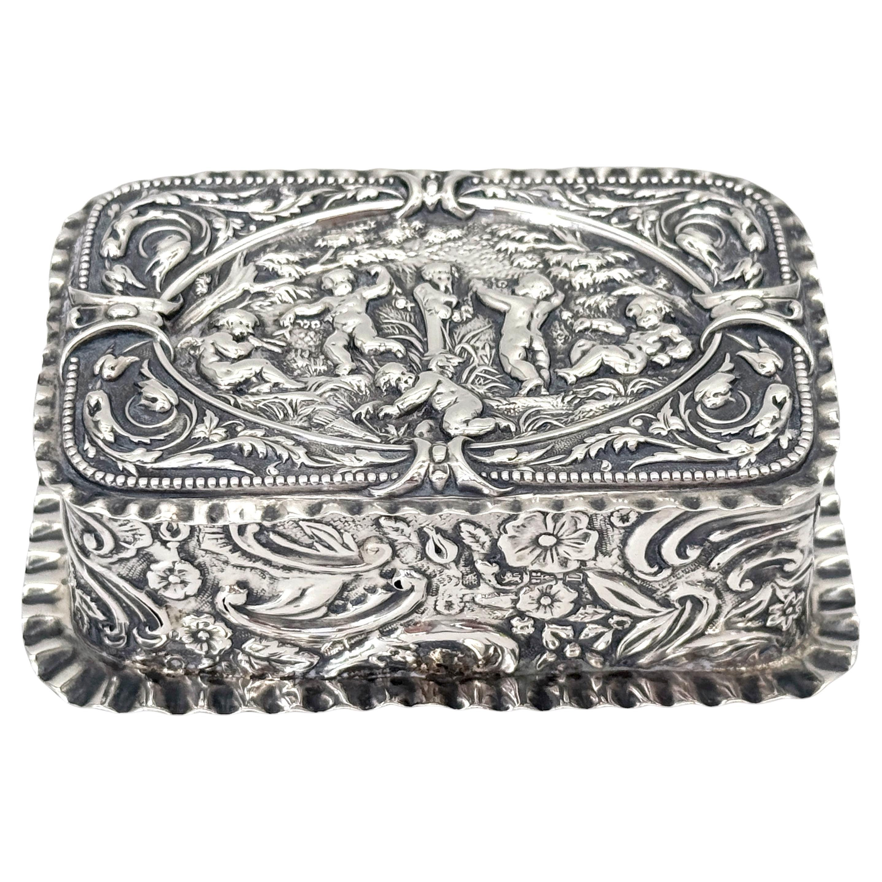 Victorian Sterling Silver Repoussé Trinket Box Putti Garden Scene, London, 1886