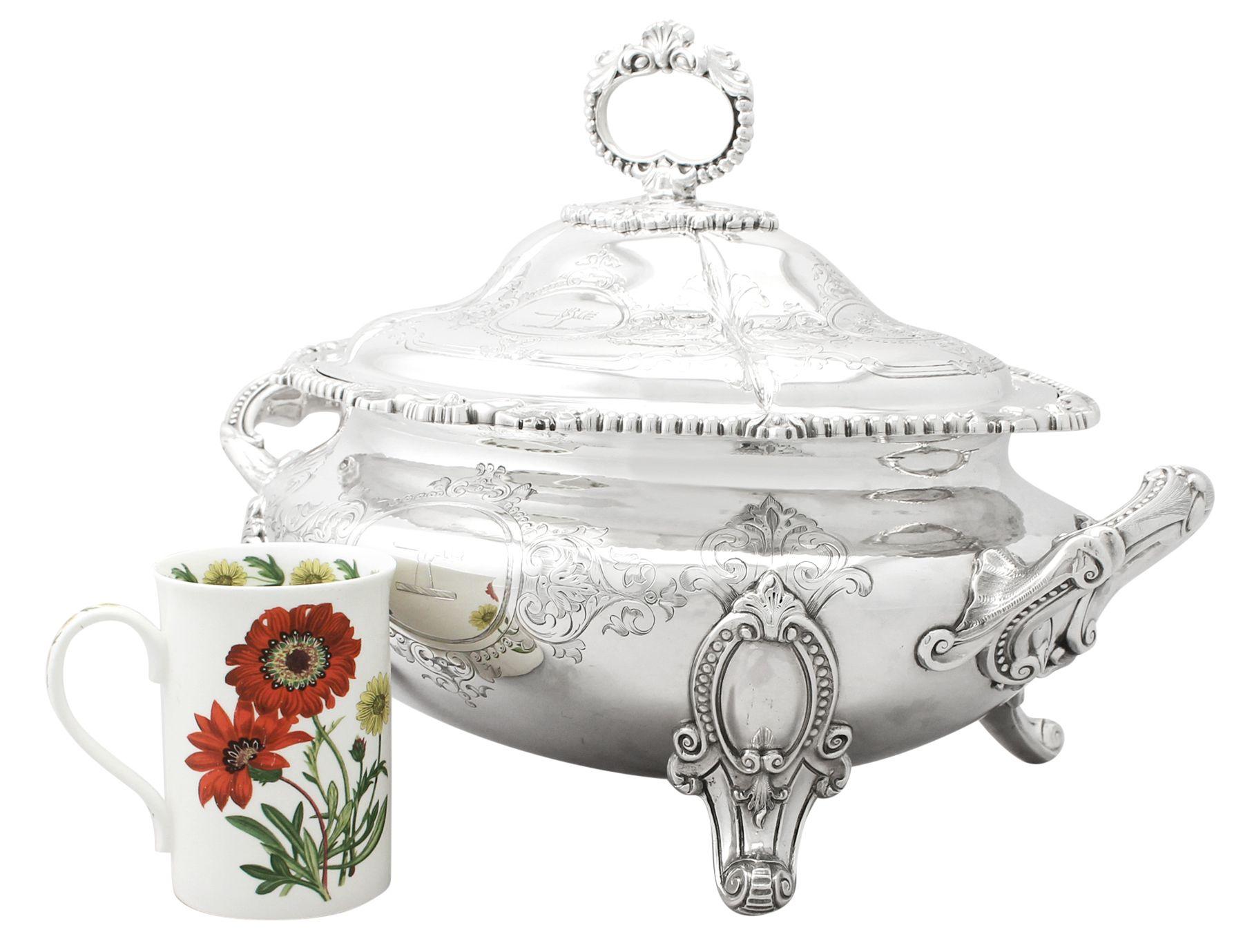 An exceptional, fine and impressive, large antique Victorian English sterling silver soup tureen; an addition to our dining silverware collection

This exceptional antique Victorian sterling silver dish has an oval rounded form.

The surface of