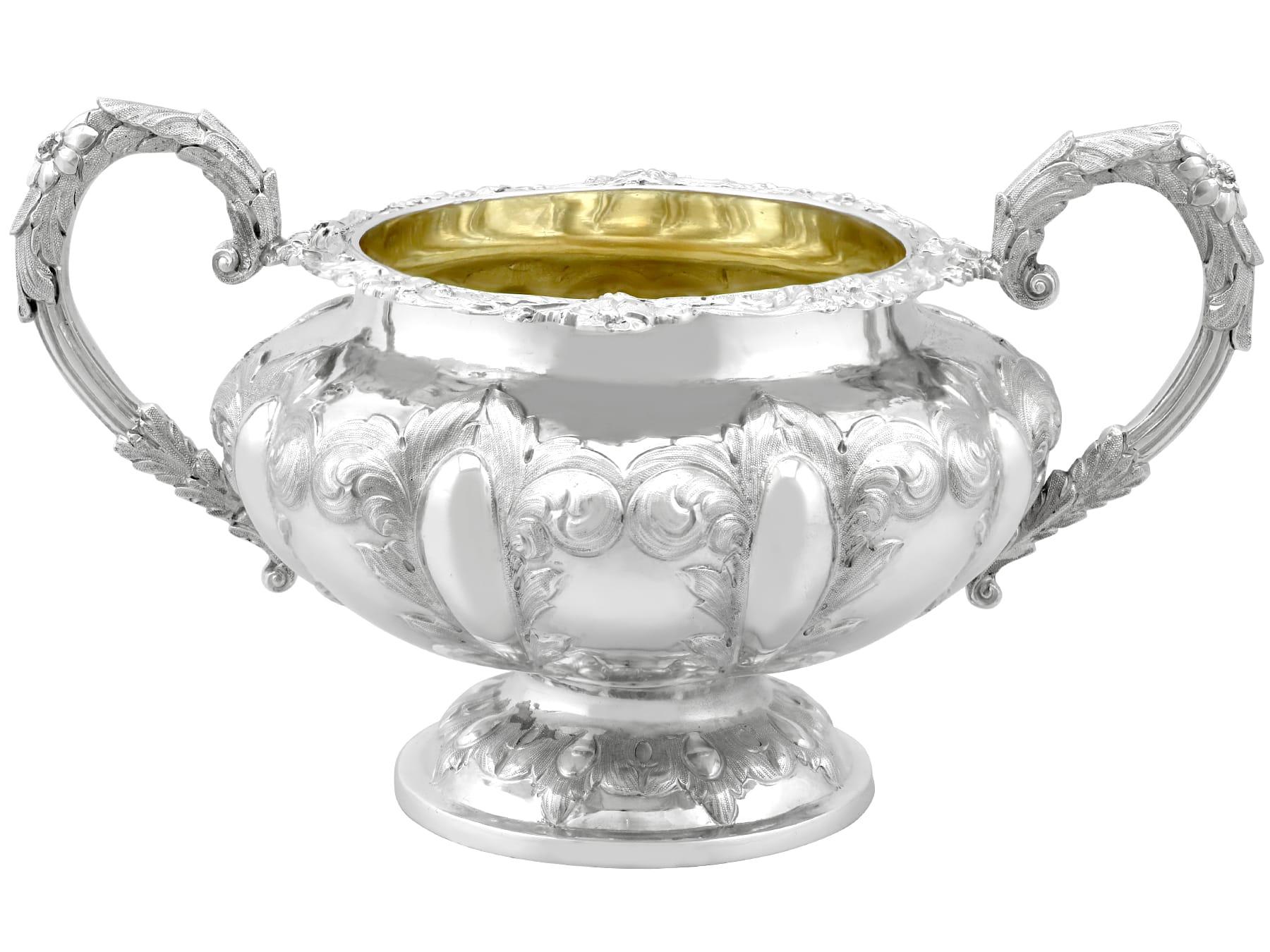 An exceptional, fine and impressive antique Victorian English sterling silver sugar bowl; an addition to our dining silverware collection

This exceptional, fine and impressive antique Victorian silver sugar bowl, in sterling standard, has a