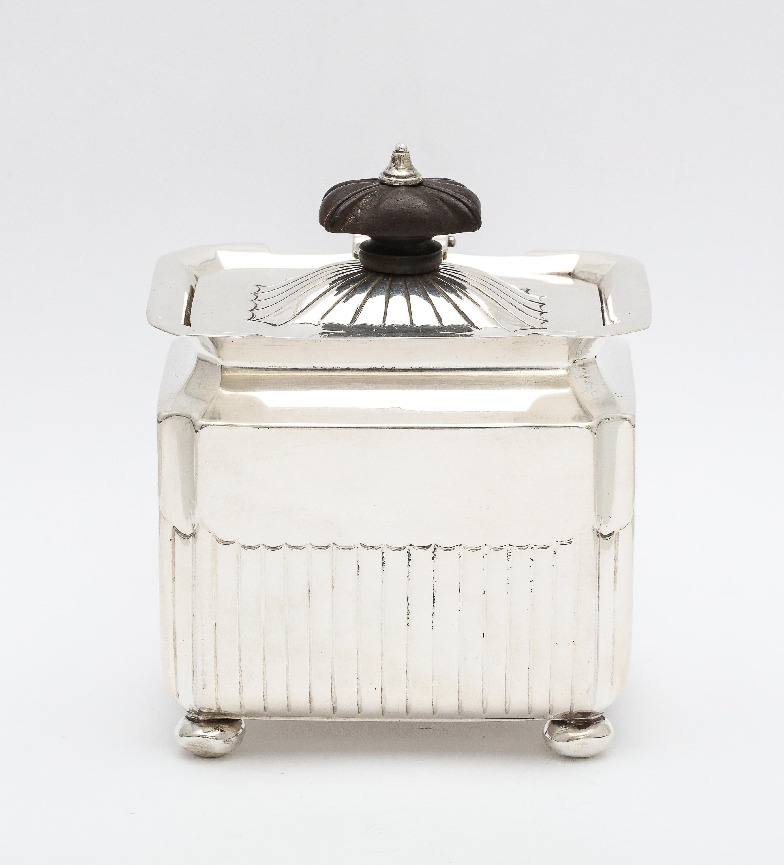 Victorian sterling silver tea caddy with hinged lid, Sheffield, England, year hallmarked for 1890, William Gibson and John Langman (silversmiths for The Goldsmiths and Silversmiths Co. in London) - makers. Measures 4 1/4 inches high (to top of