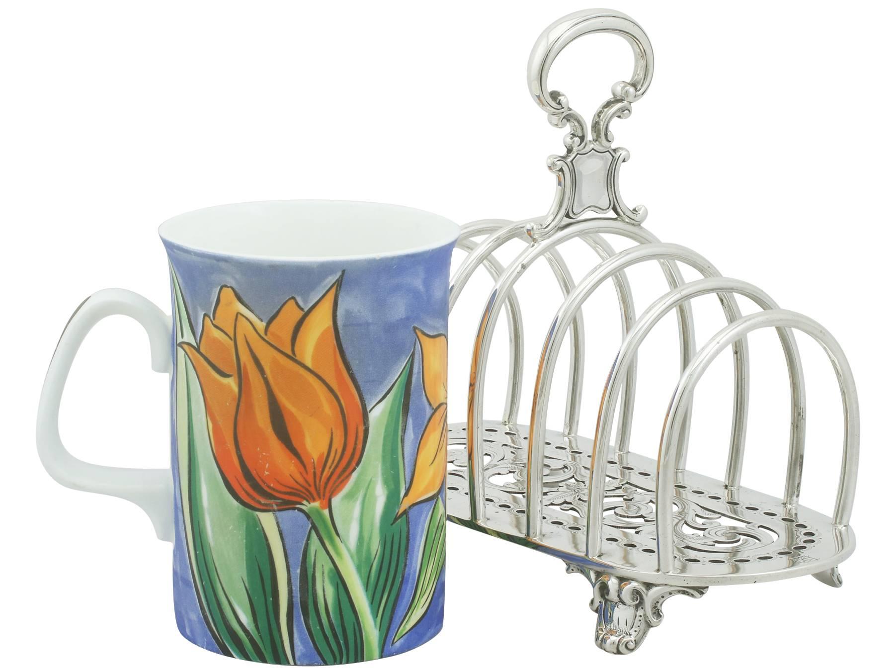 An exceptional, fine and impressive antique Victorian English sterling silver toast/letter rack; an addition to our dining silverware collection

This exceptional antique Victorian sterling silver toast rack has a rounded oval form.

The toast