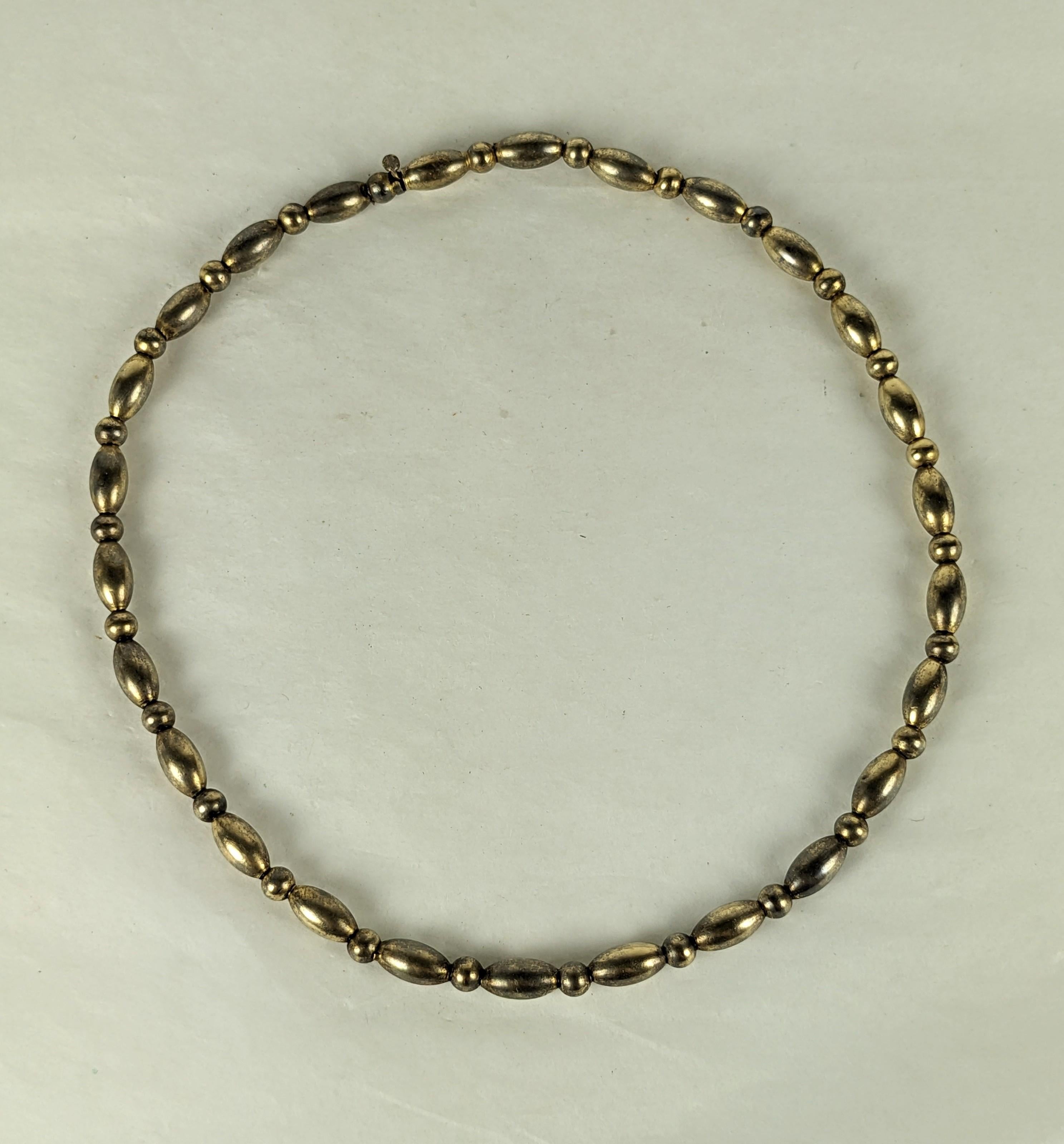 Victorian Sterling Young Girls Bead Necklace. Sterling beads in marquise and round shapes. Small size with sturdy engineered clasp. Has a light vermeil finish, 1880's USA. 12.75