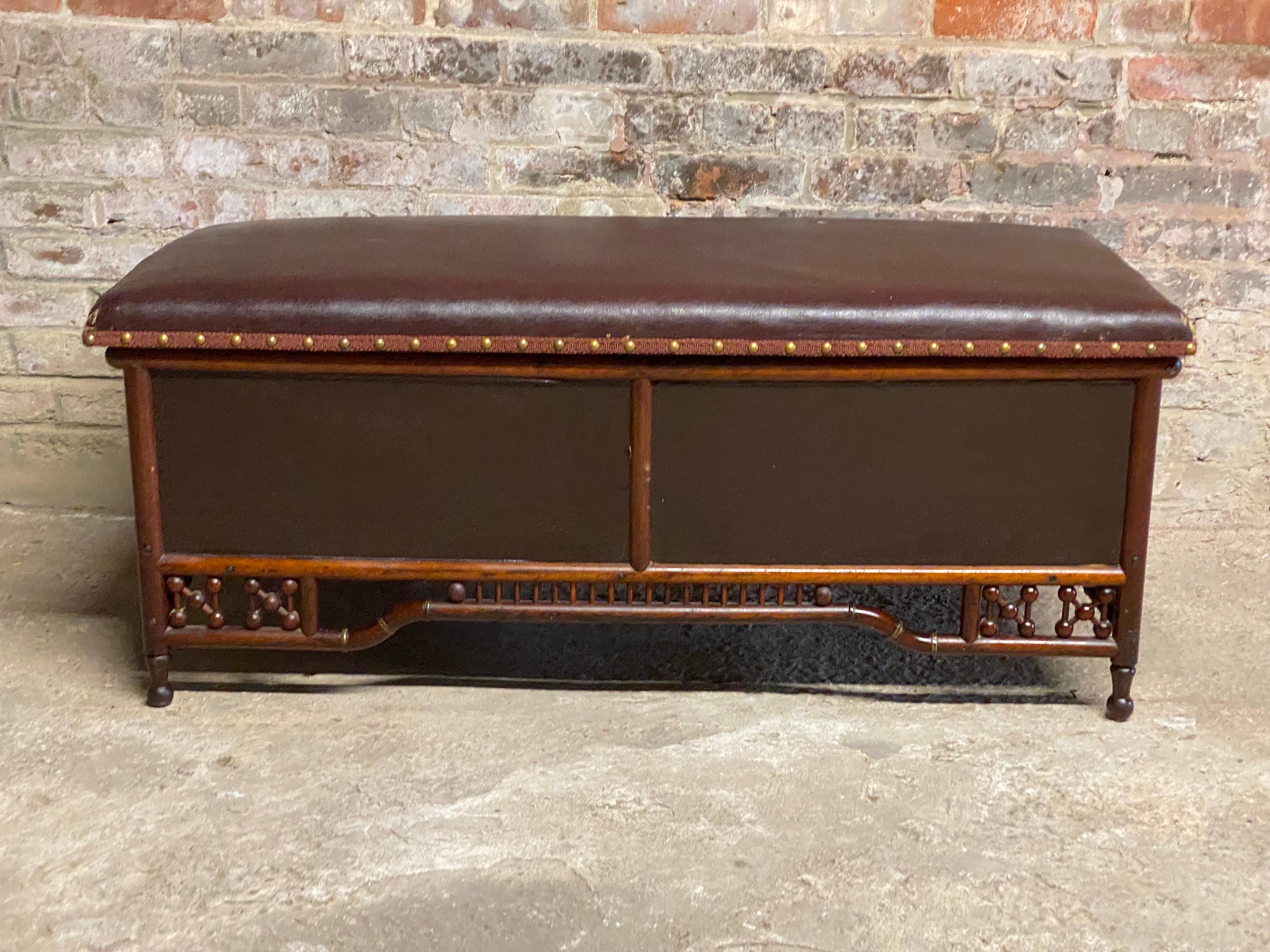 Fine example of a Late Victorian stick and ball blanket chest. Upholstered oilcloth top and textured paneled sides supported by a gorgeous intricate base stick and ball base. The storage compartment is large and deep for multiple items like