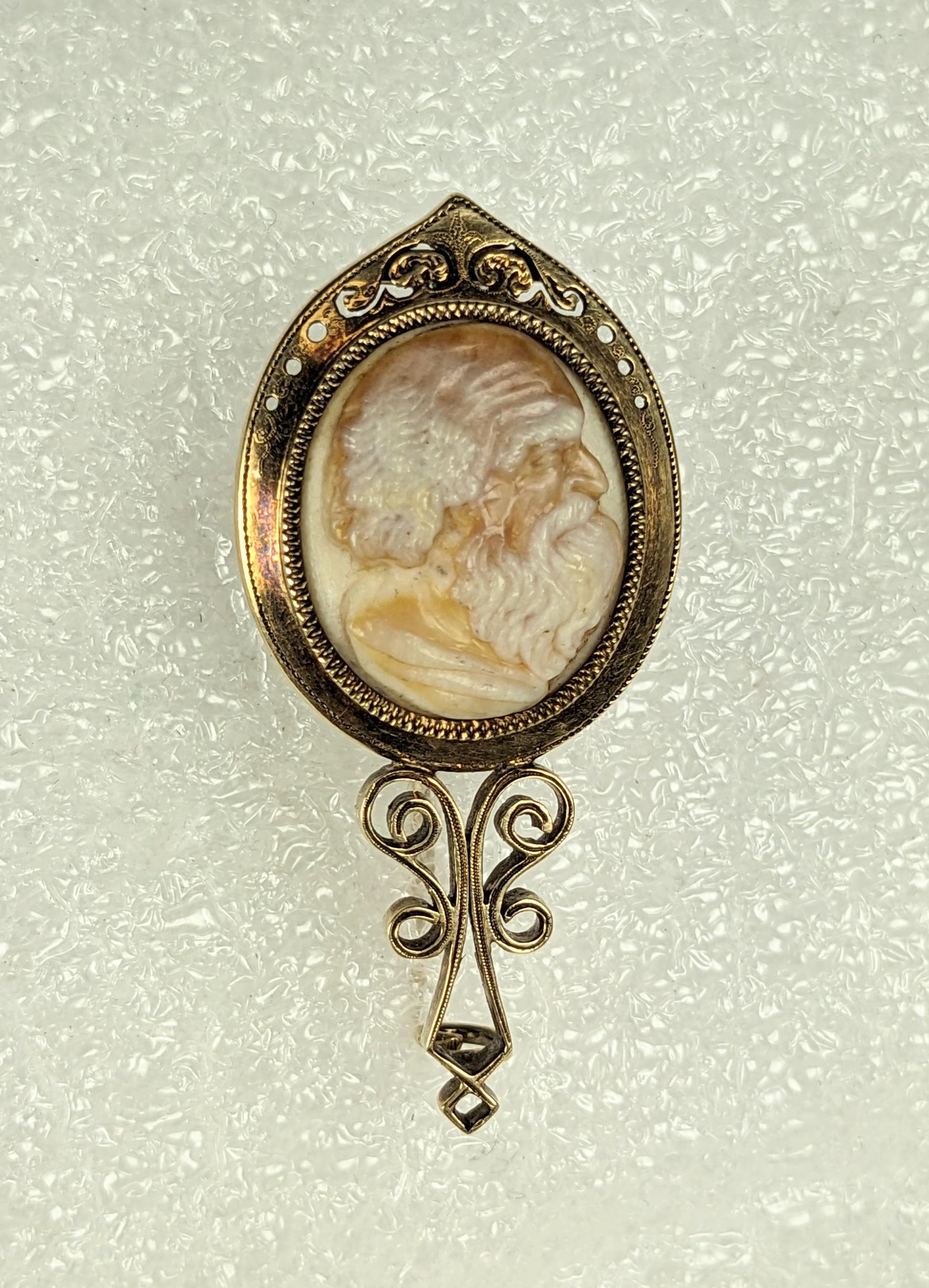 Lovely Victorian Stone Cameo Scholar Brooch set in a 14k hand mirror form with etched with pierced decor. Beautifully carved profile of an old man in agate so hair remains white and skin is the darker layer underneath. 1860's Europe. 1.75