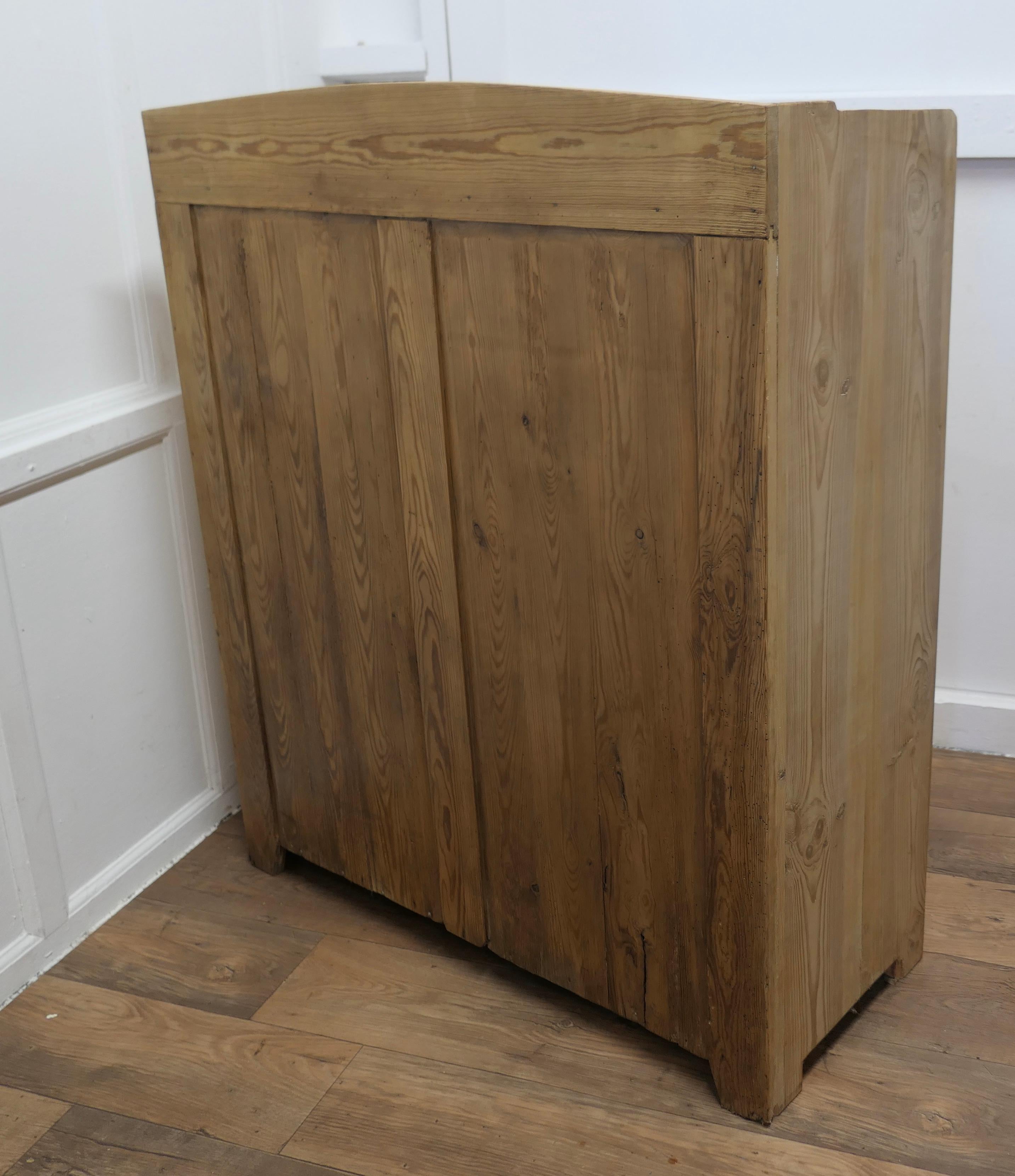 Victorian Stripped Pine Greeting Station Cupboard 

This is a very good quality cupboard, it has  been used as a Restaurant Greeting Station, it has a panelled front and a flat galleried top, 3 deep storage drawers and a tall cupboard below with