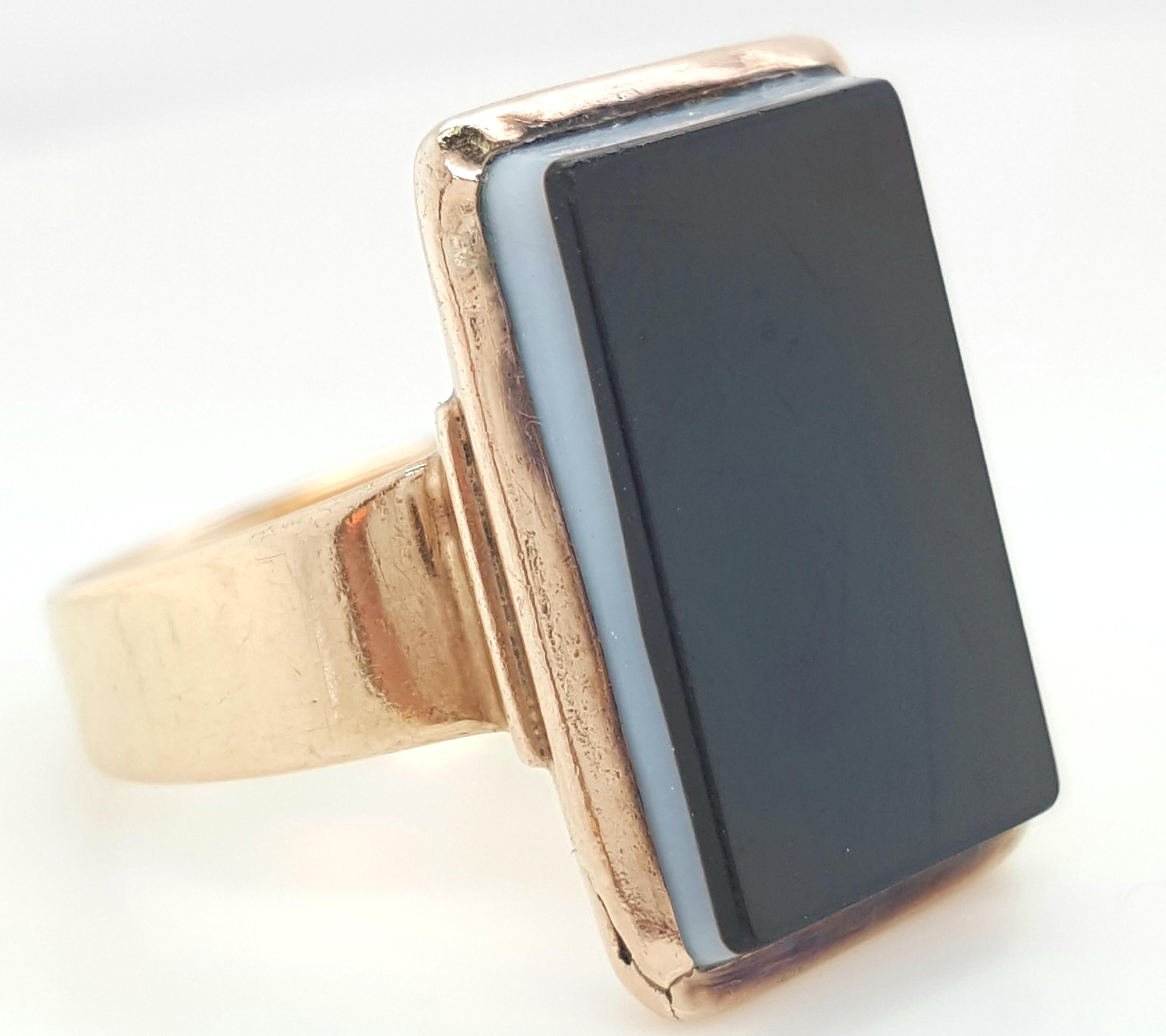 Victorian Style 14 Karat Rose Gold Hardstone Bezel Set Ring.  The interior of this low profile ring curves around your finger and makes a bold statement with it's black and white hardstone center stone.   The shank tapers from 19.64 x 14.07 mm. 