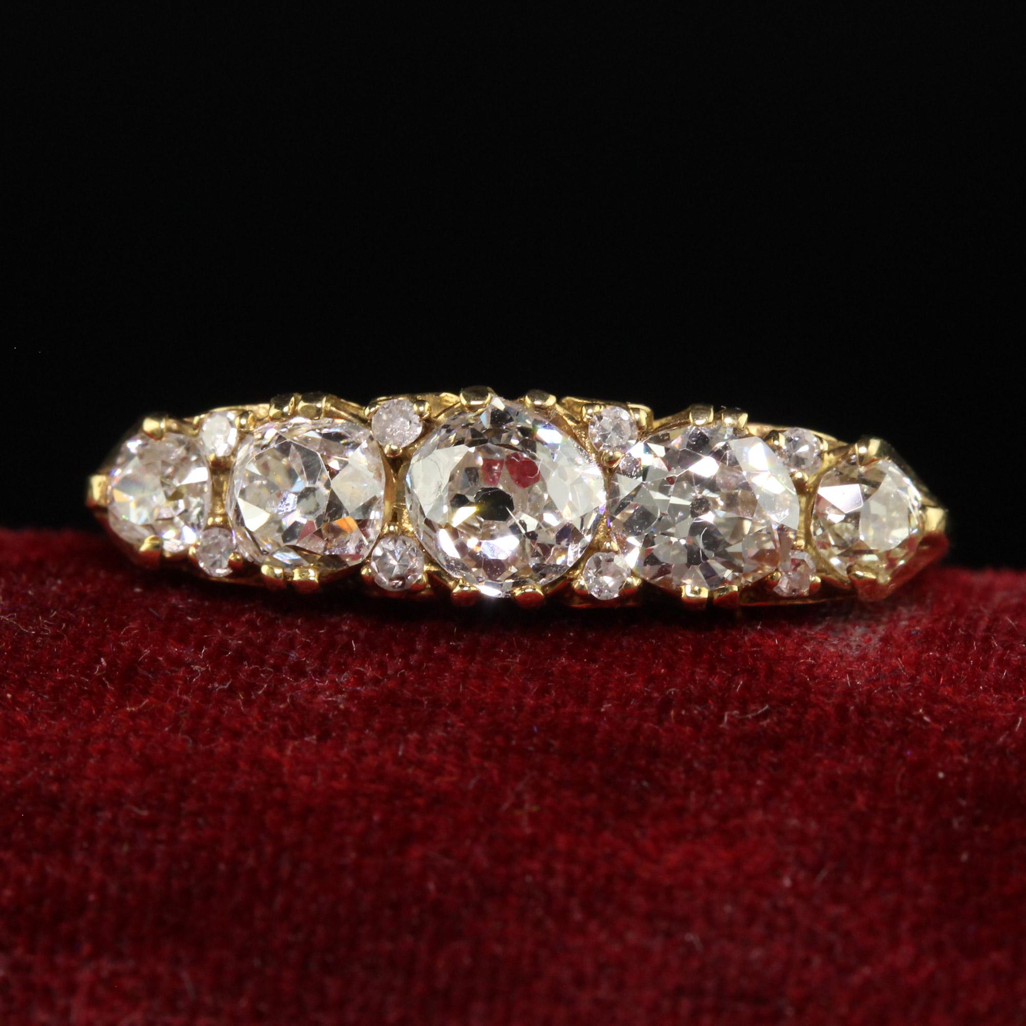 Beautiful Victorian Style 18K Yellow Gold Old Mine Diamond Five Stone Ring. This gorgeous Victorian Style old mine diamond ring is crafted in 18k yellow gold. The top of the ring has gorgeous five chunky old mine cut diamonds with smaller diamonds