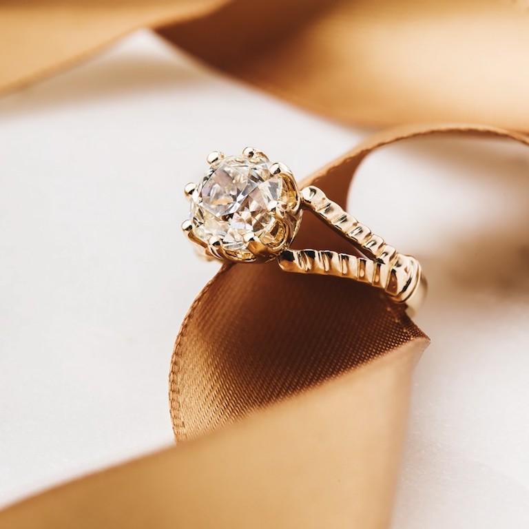 Based on one of our most popular rings, this is a captivating reproduction of a vintage engagement ring we once had, made in downtown Los Angeles. Modeled after its Victorian predecessor, this 18k rose gold stunner features a 2.38cts EGL certified