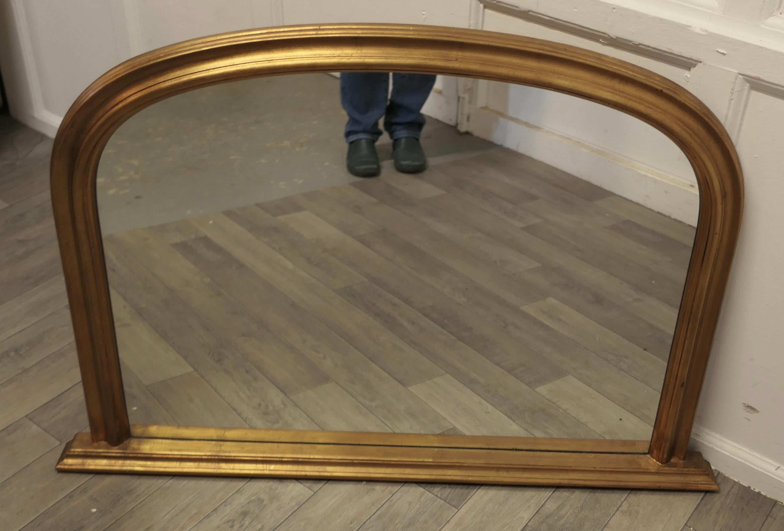 gold fireplace mirror