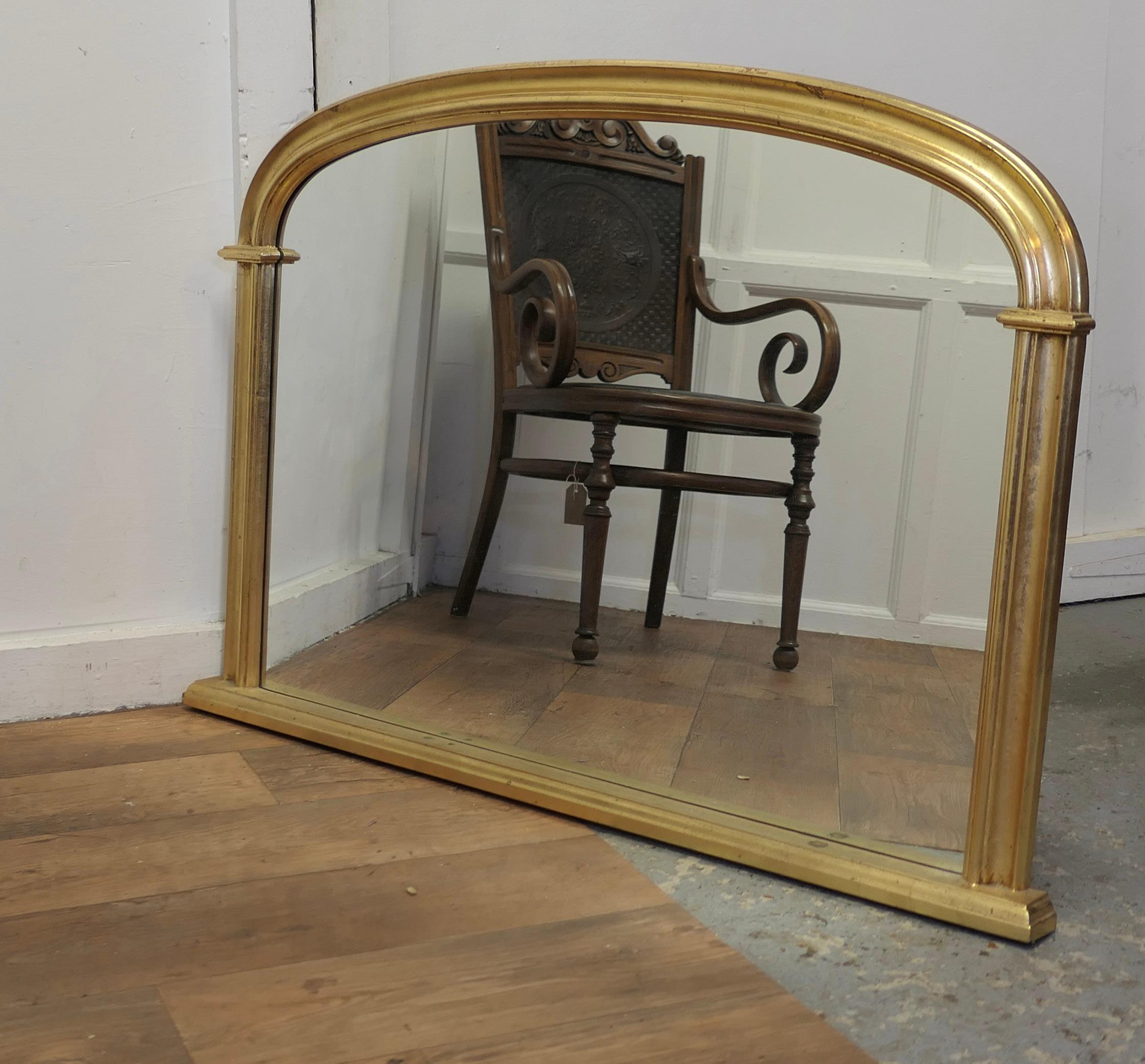 Victorian Style Arched Gold Overmantel Mirror

A Lovely Over Mantle Mirror 

This is a charming piece, the 2.5” arched moulded frame is lightly curved with a flat base
The Mirror is in good attractive condition
The Mirror is 32” high, 46” wide, and