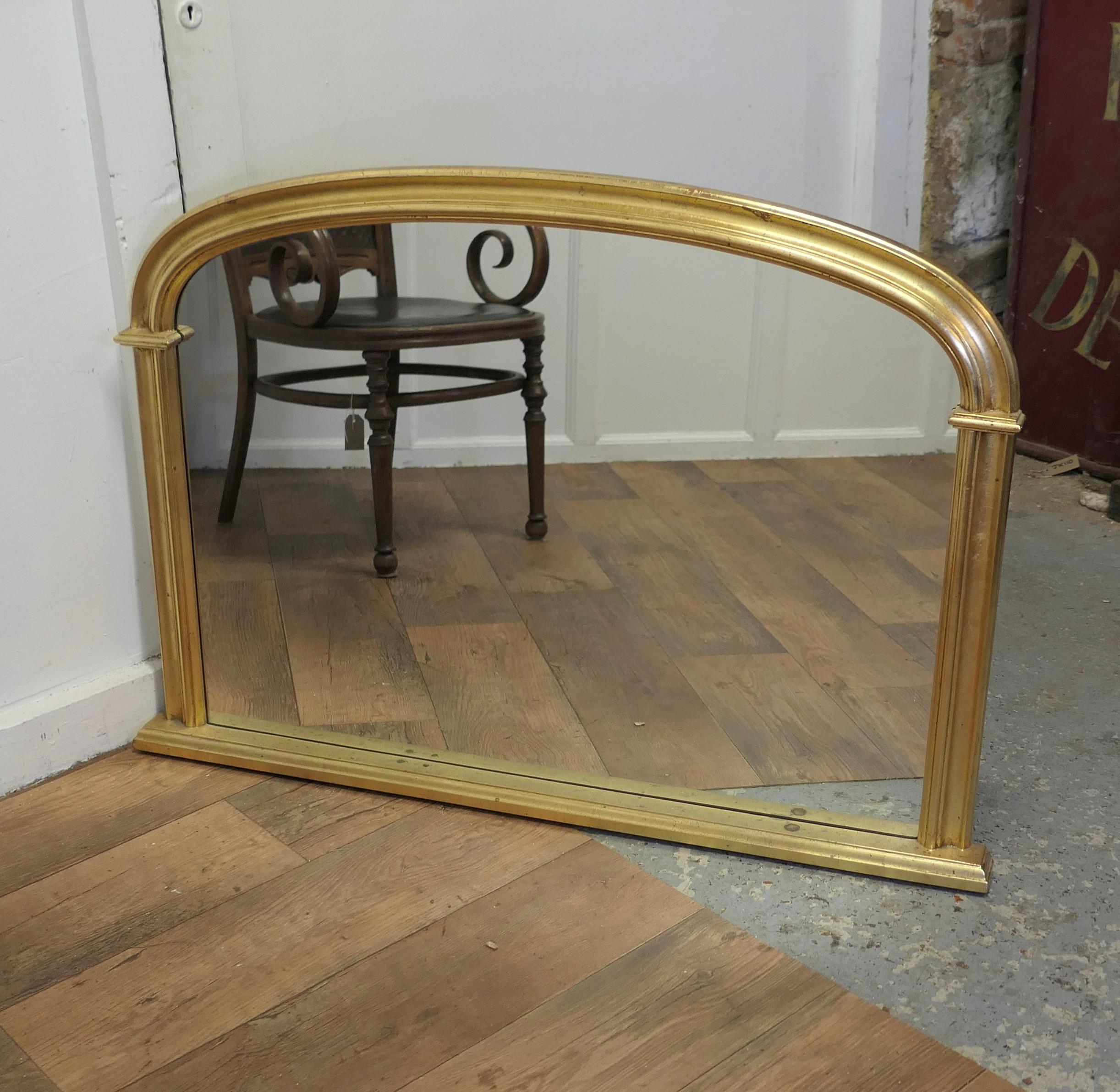 20th Century Victorian Style Arched Gold Overmantel Mirror  A Lovely Over Mantle Mirror    For Sale