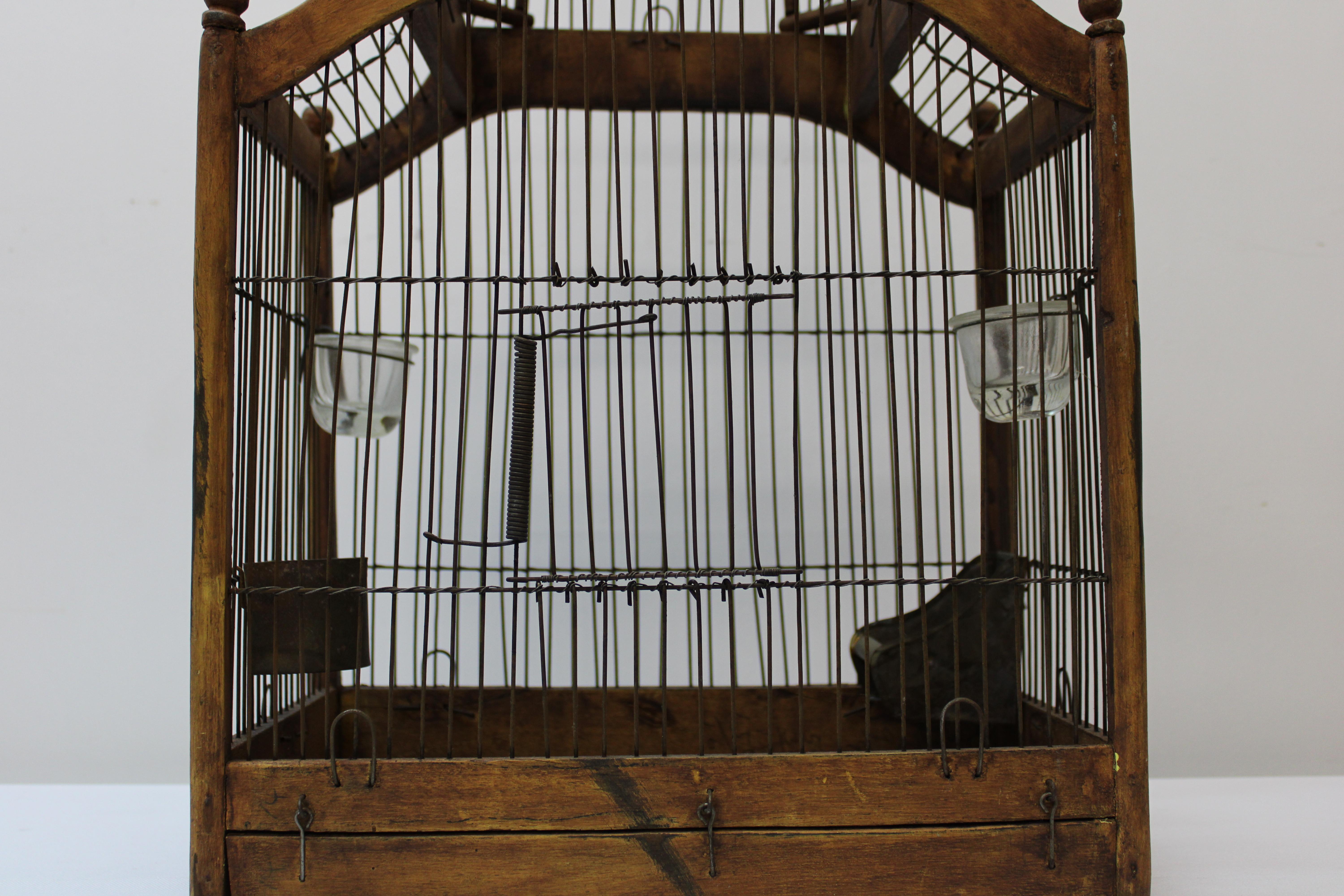 C. Early 20th Century

Victorian Style Architectural Dome Top Wood Bird Cage.