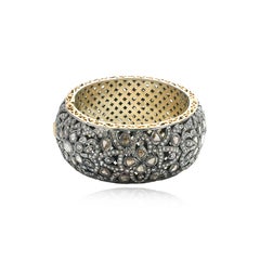 Victorian style bangle studded with natural diamonds in gold and silver