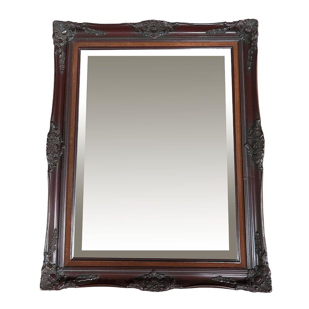 Questo specchio da parete in ciliegio impreziosito dal barocco vintage emana un'eleganza classica grazie alla cornice ricca di dettagli e alla finitura in ciliegio profondo. Il design ornato presenta intricati intagli che riflettono l'opulenza dello