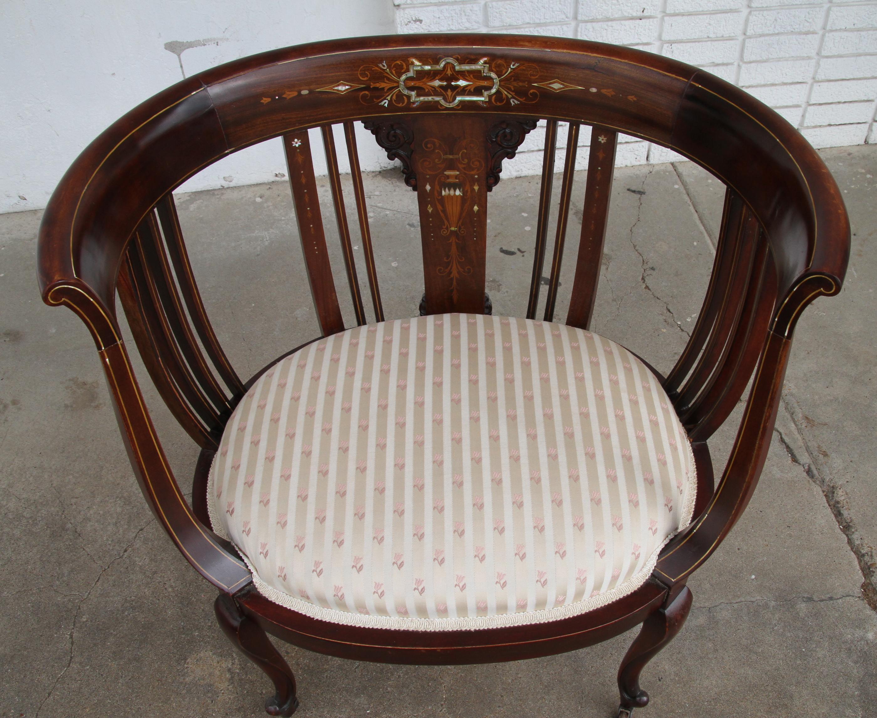 Antique Inlay Barrel Armchair
Early 20th century

Intricate mother of pearl inlays with silk brocade fabric seat. Castors.

Dimensions
30” W
21” D
32