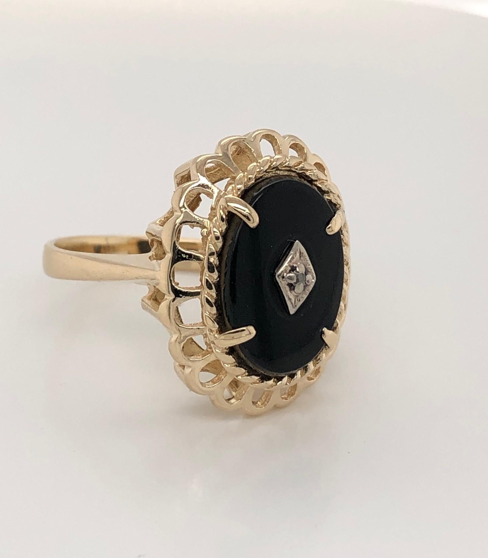 Oval Cut Victorian Style Black Onyx Yellow Gold Oval Ring with Diamond Accent