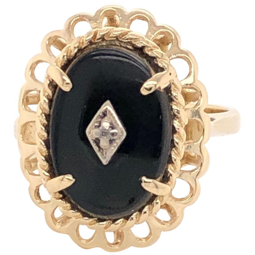 Victorian Style Black Onyx Yellow Gold Oval Ring with Diamond Accent