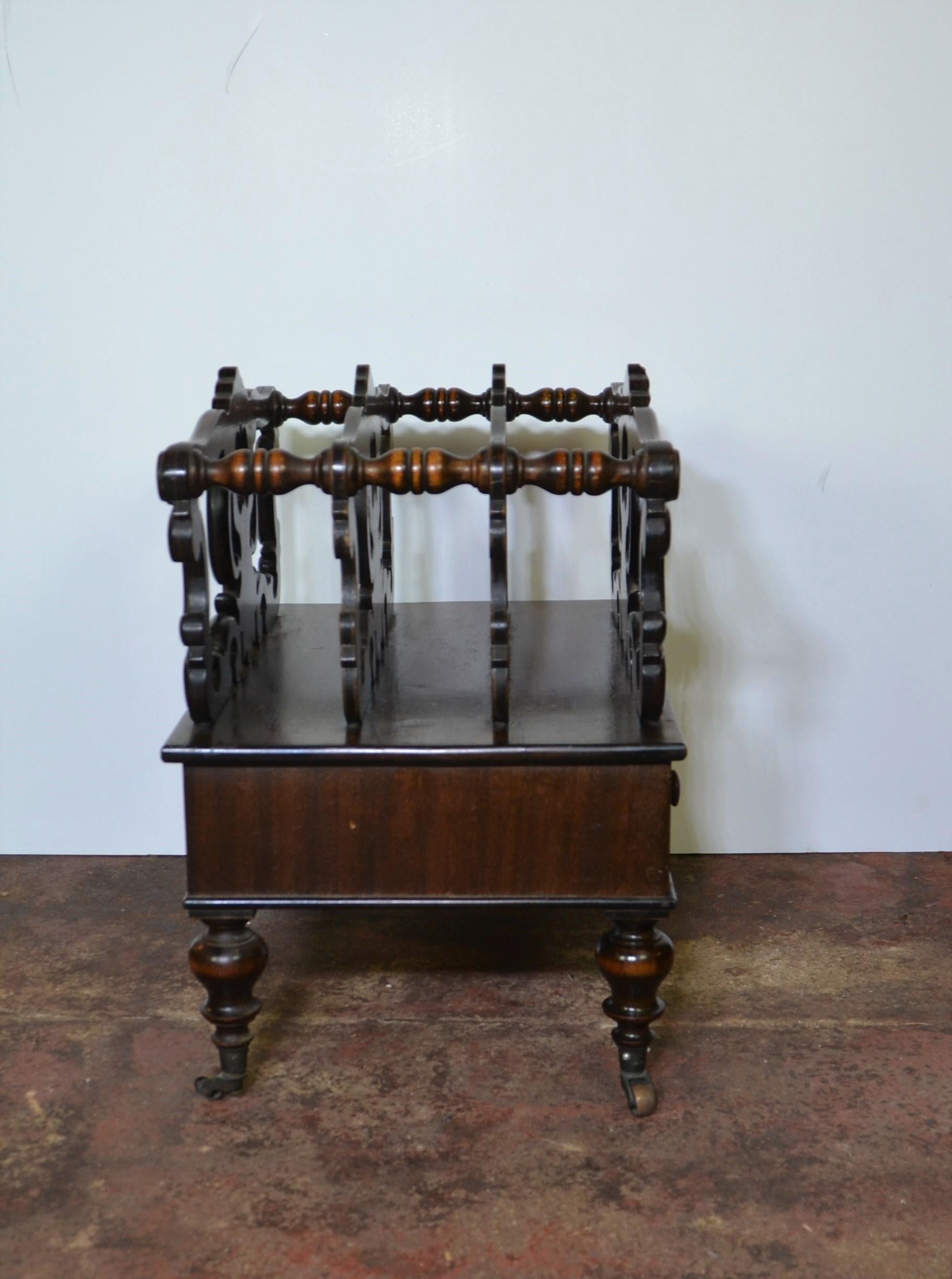 A good quality canterbury (sheet music stand) in mahogany with 3 compartments and a drawer. Good Rococo carving. Bulbous legs. Drawer liner also in hardwood mahogany. Commonly used today as magazine racks.