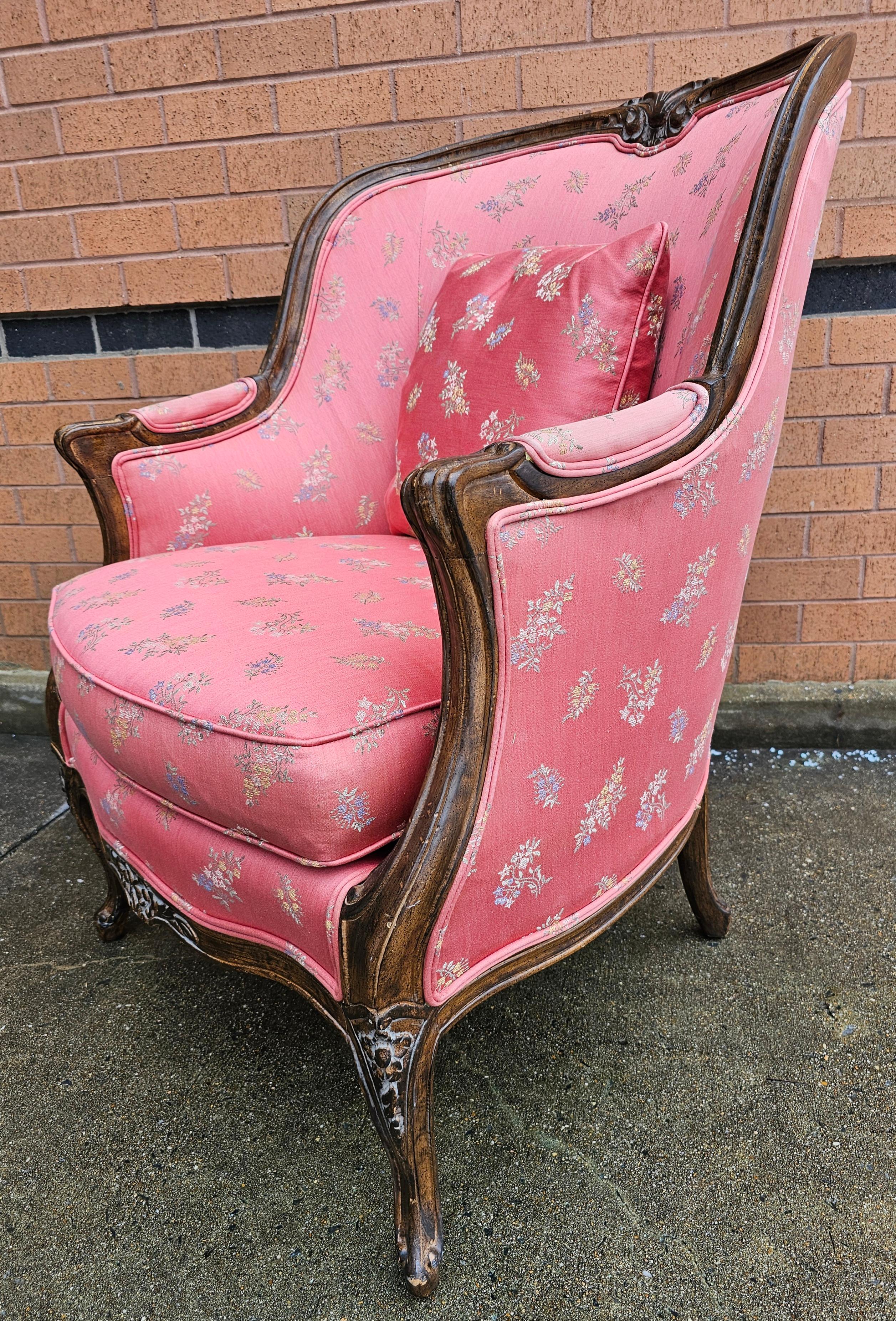 A Victorian Style Carved Fruitwood and Upholstered Lounge Chair in good vintage condition. Clean upholstery Measures 29