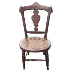 Victorian Style Carved Walnut and Cane Seat Youth Chair