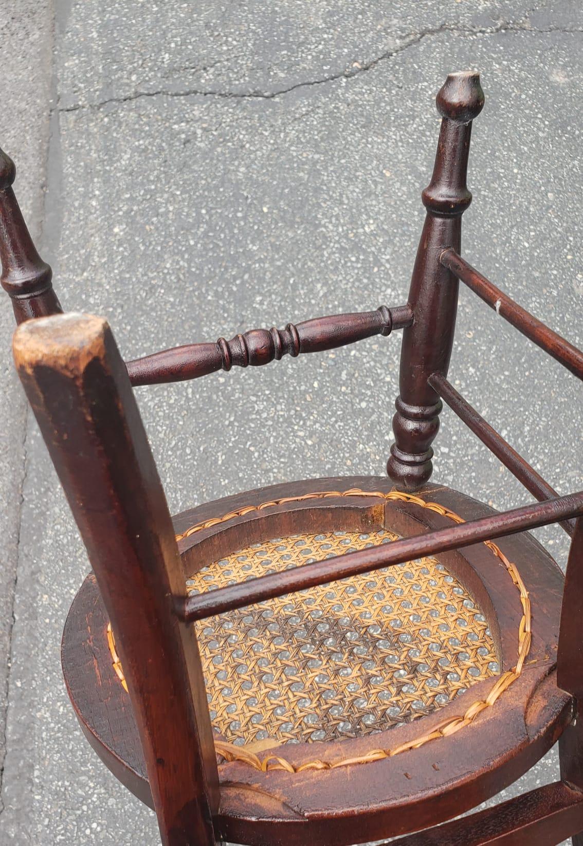 Caning Victorian Style Carved Walnut and Cane Seat Youth Chair For Sale