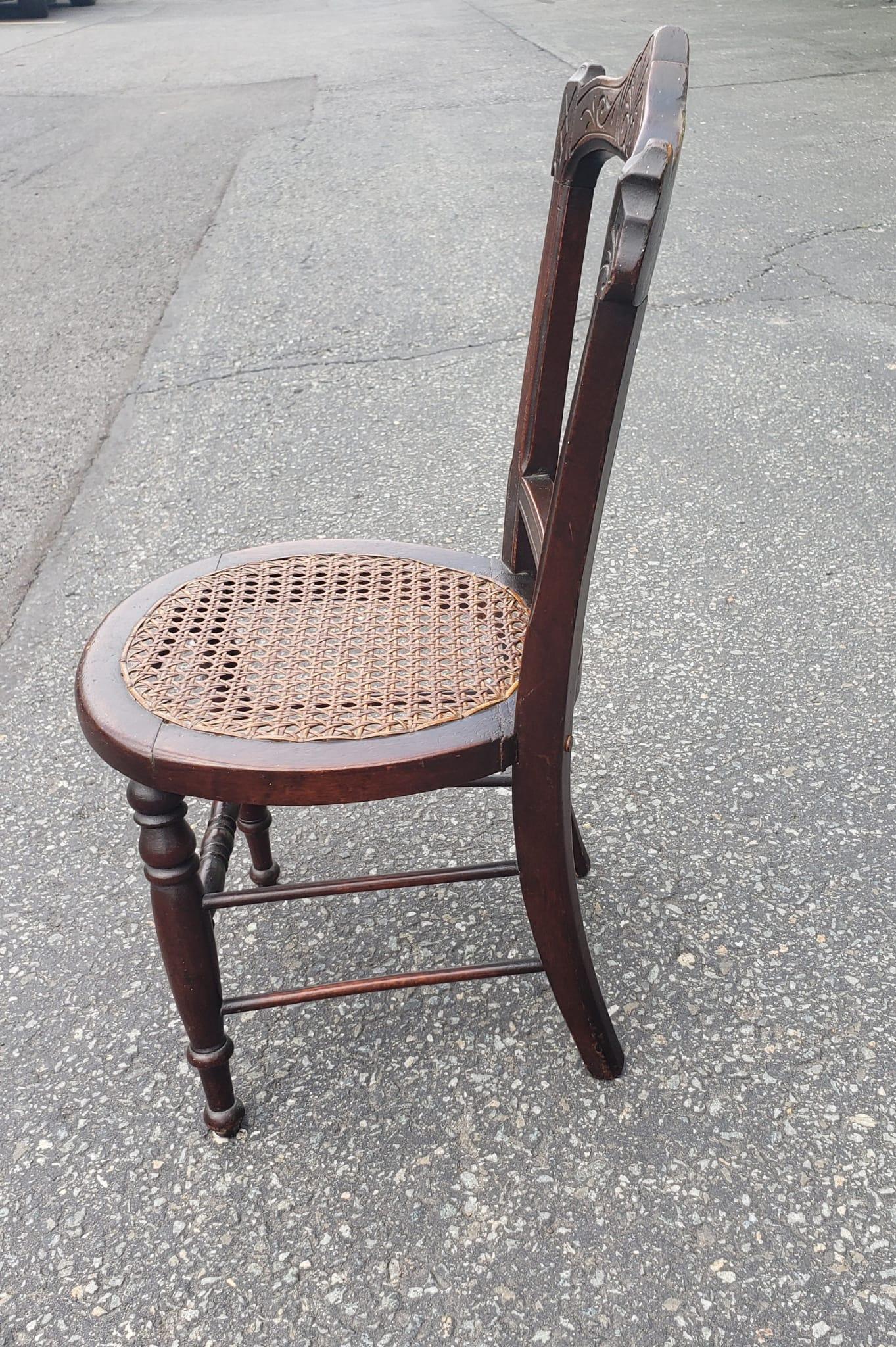20th Century Victorian Style Carved Walnut and Cane Seat Youth Chair For Sale
