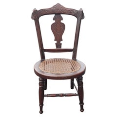 Victorian Style Carved Walnut and Cane Seat Youth Chair