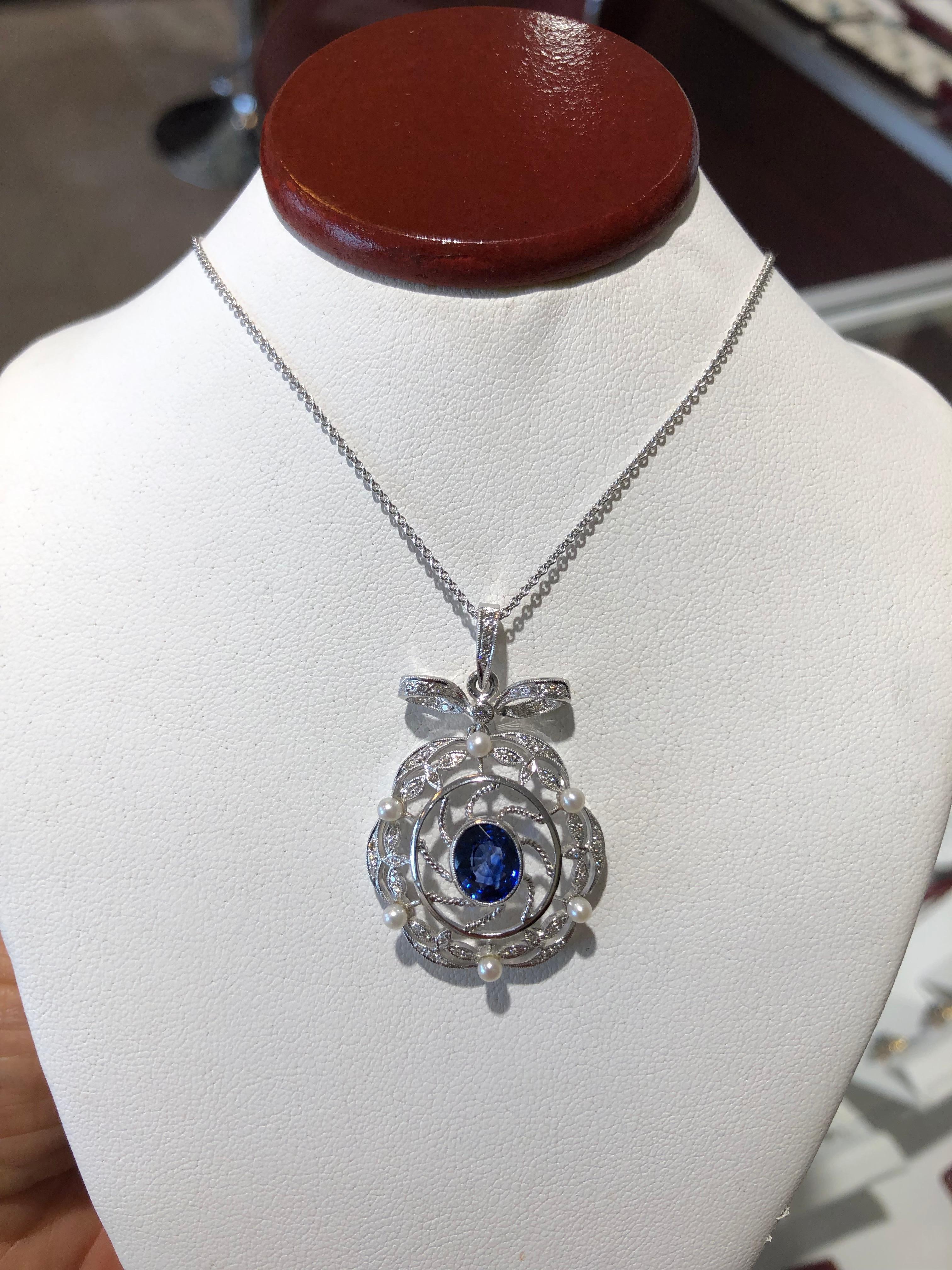 Victorian Style Ceylon Sapphire Diamond Pearl 18K Gold Pendant Necklace
Fantastic Pendant Modeled after one of the most extravagant time periods. Featuring numerous diamonds and lustrous seed pearls sprinkled throughout the expertly crafted mesh 18K
