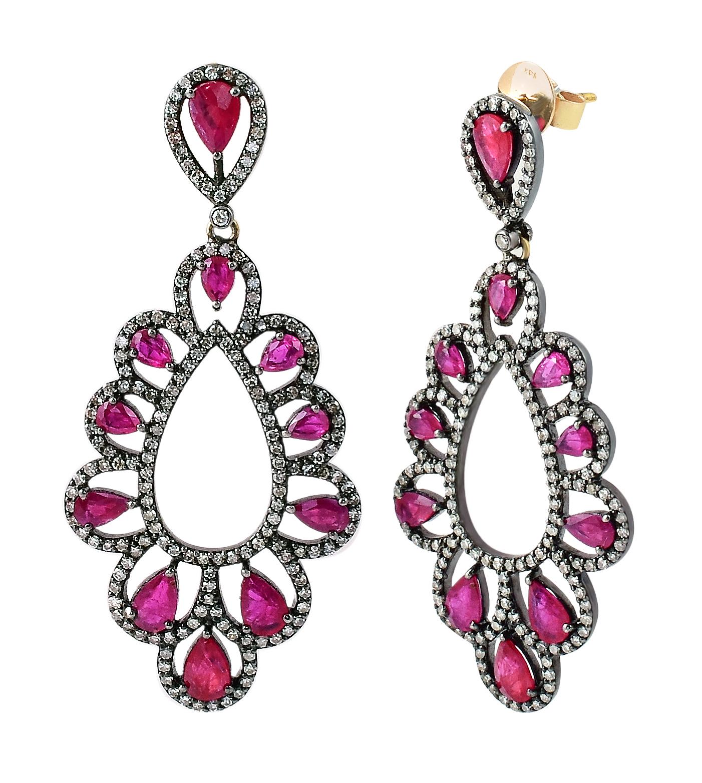 Victorian Style Diamond and Ruby Dangle Earrings

This Victorian style wine red ruby and diamond long earring is gorgeous. The bottom overall kite shape formed with the beautiful designer element of 10 individual U-shape crafted to perfection with