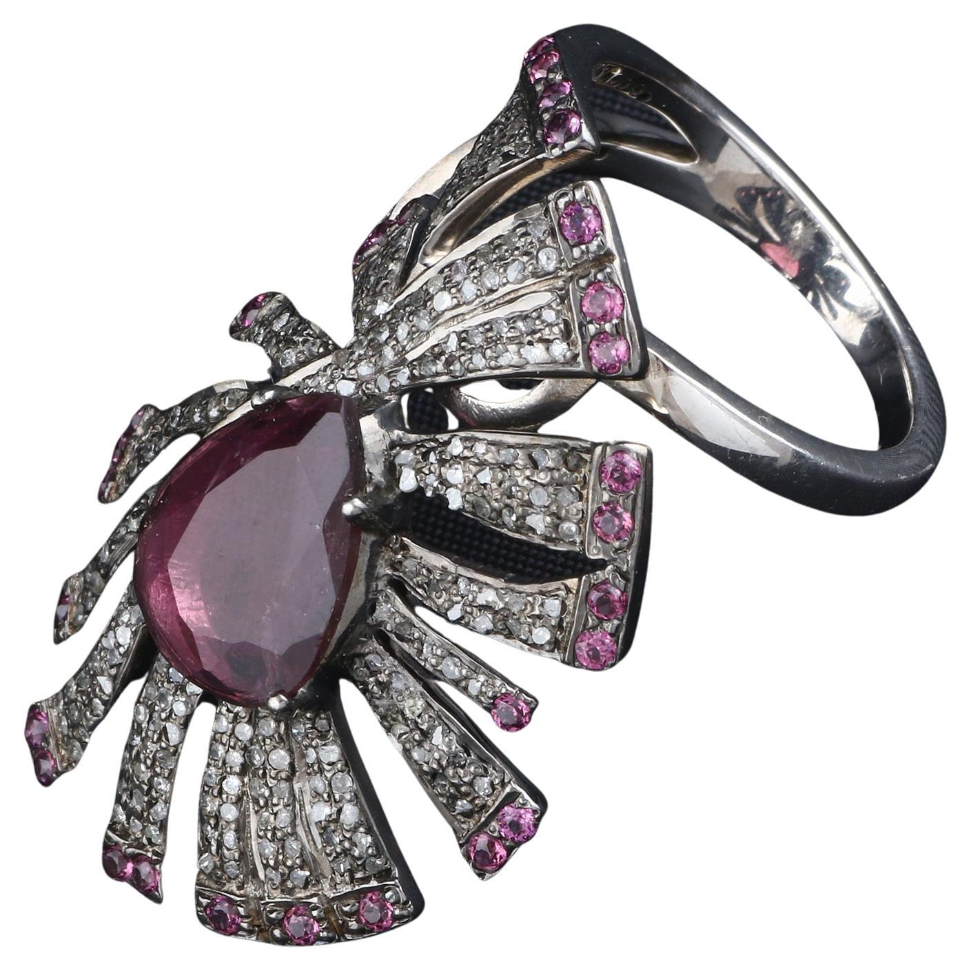 Item details:-

✦ SKU:- ESRG00126

✦ Material :- Silver
✦ Gemstone Specification:-
✧ Diamond
✧ Pink Sapphire, Pink Tourmaline

✦ Approx. Diamond Weight : 0.75
✦ Approx. Silver Weight : 8.93
✦ Approx. Gross Weight : 9.62

Ring Size (US): 8

You will