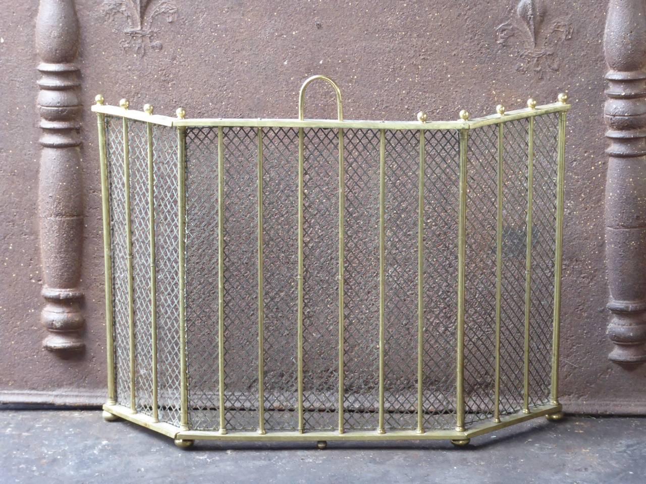 English Victorian style fireplace screen made of brass and iron mesh.

We have a unique and specialized collection of antique and used fireplace accessories consisting of more than 1000 listings at 1stdibs. Amongst others, we always have 500+