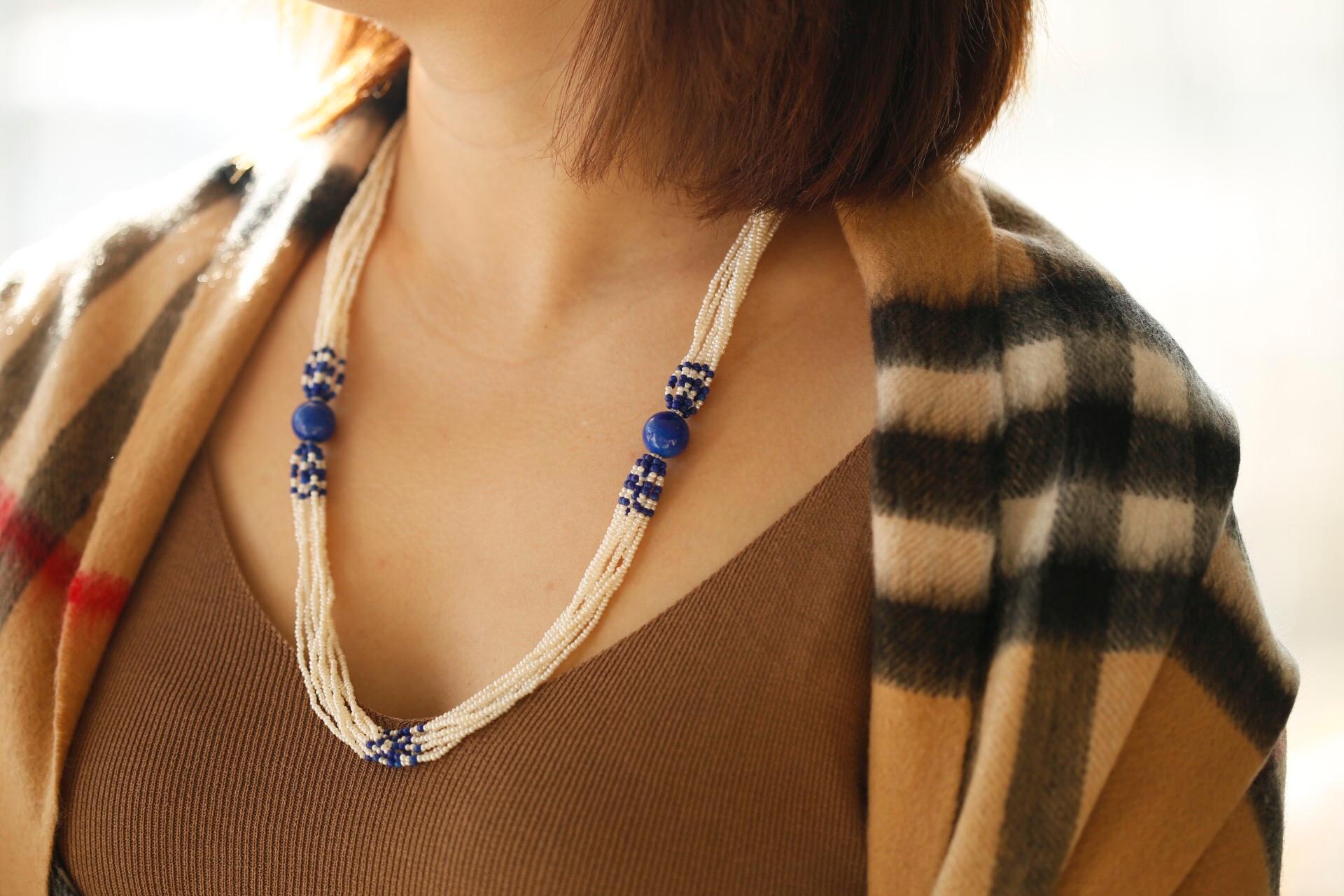 A remarkable lapis lazuli and pearl necklace, enhanced with bright and lively diamonds.

Ropes of delicate pearls gracefully falling amongst one another, mixed with sprays of bright and vivid blue lapis lazuli like a starry night sky. The colour