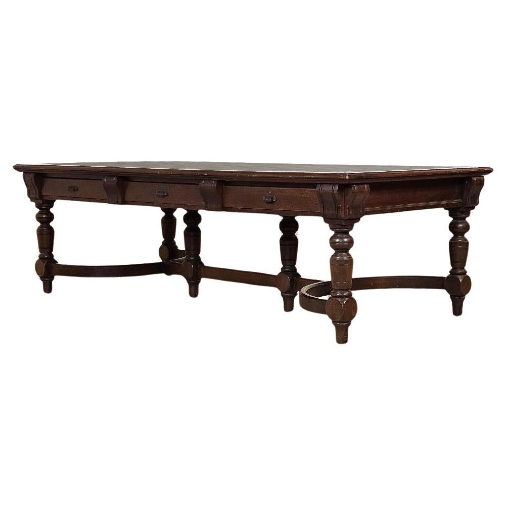 This Victorian Style Library Table with a Black Writing Surface is surely to be a focal point to your library, office or great room.  This truly is a stately and elegant piece crafted in walnut from a bygone era.  At present it is far from perfect