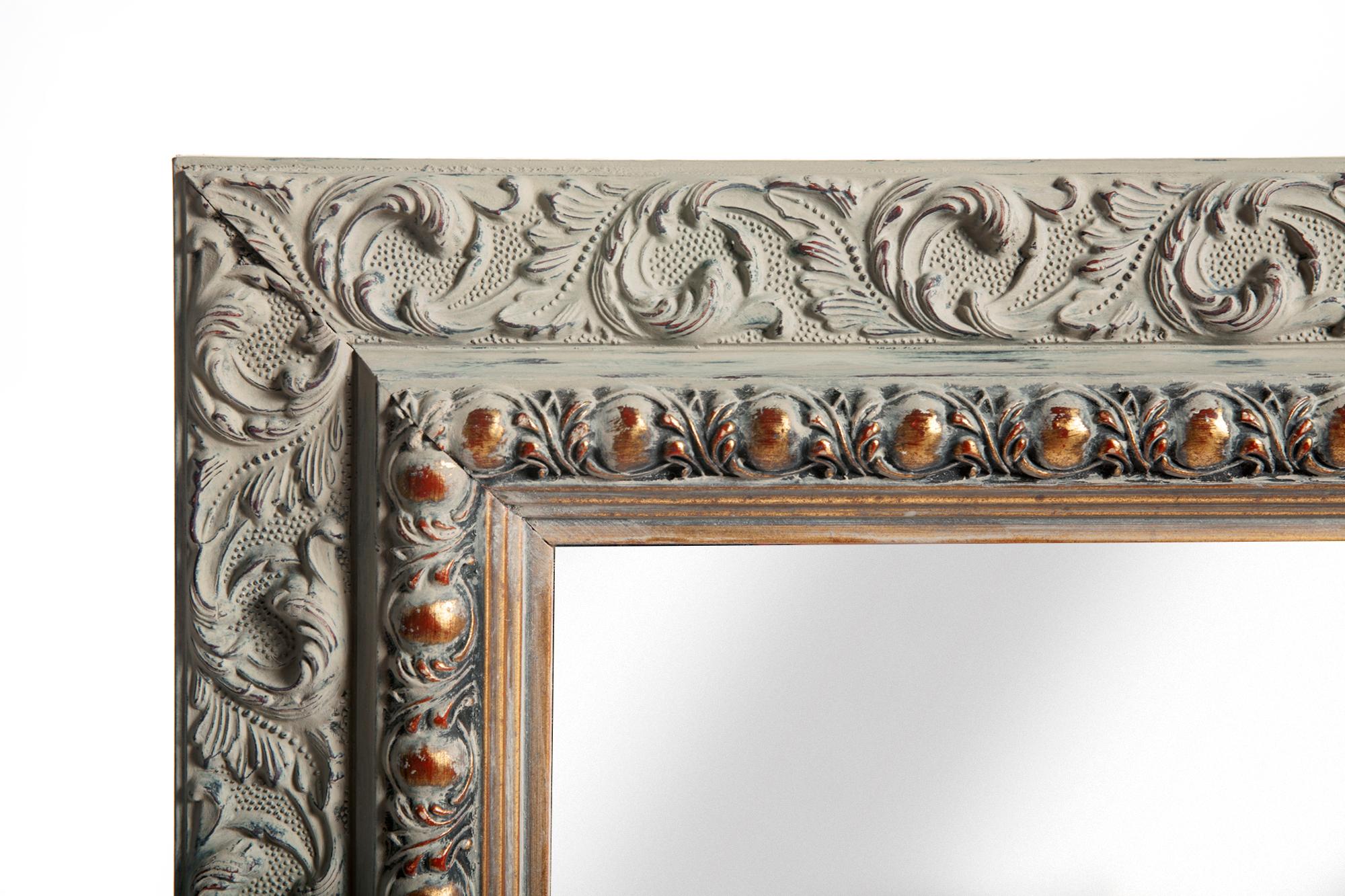 Vintage Victorian style frame, hand painted in neutral tones over slate red & gold. New mirrored glass & backing.
Measures: 1.75