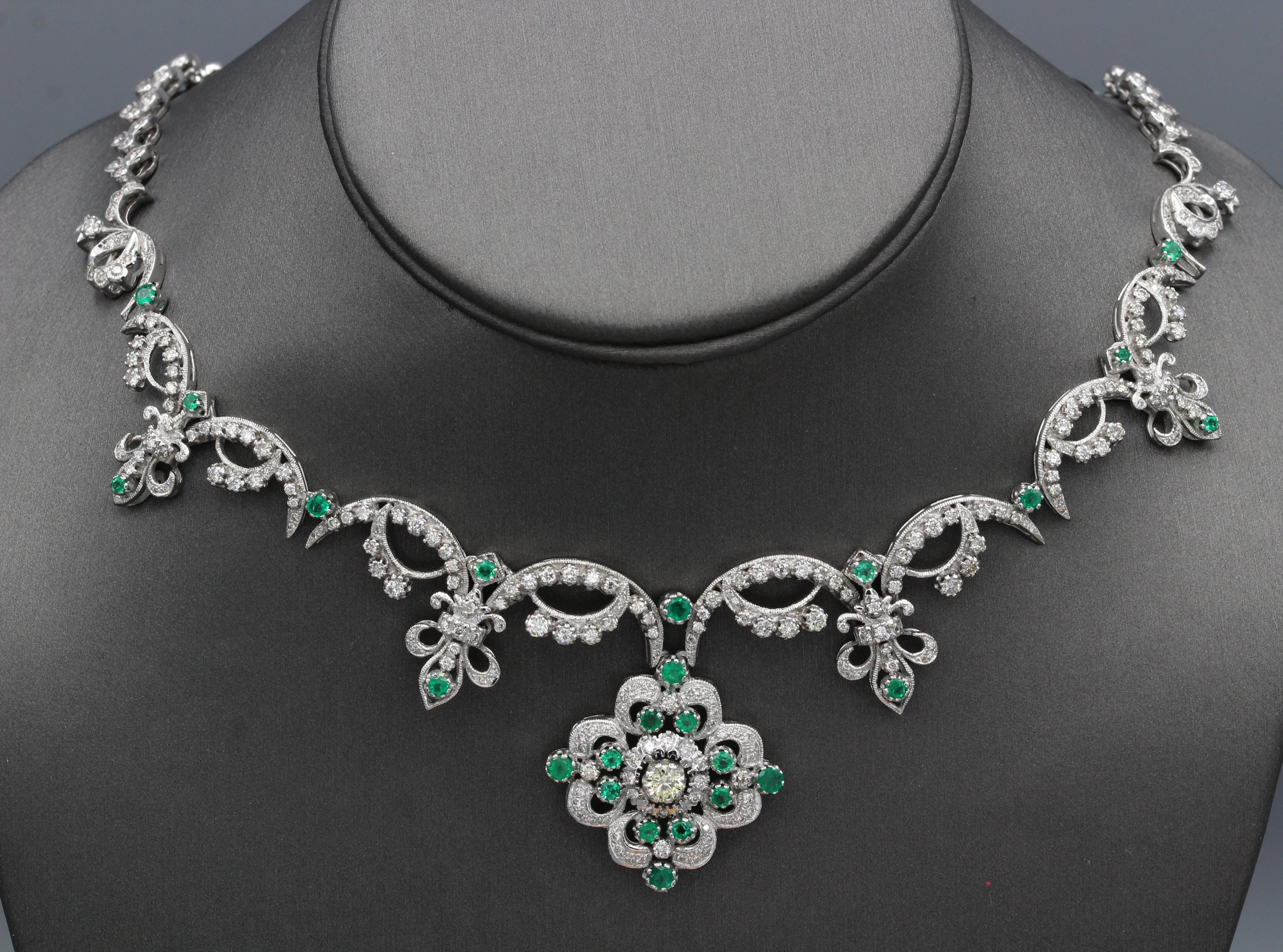 New, never used Fancy Victorian Style Necklace, Diamonds & Diamonds, Vintage -bwas made a bit over 20 Years Ago.
Total natural Diamonds 9.05 Carat, GH-SI. 
Total natural Emerald 1.96 Carat. 18k White Gold 64 Grams. Center Piece is approx. 1'