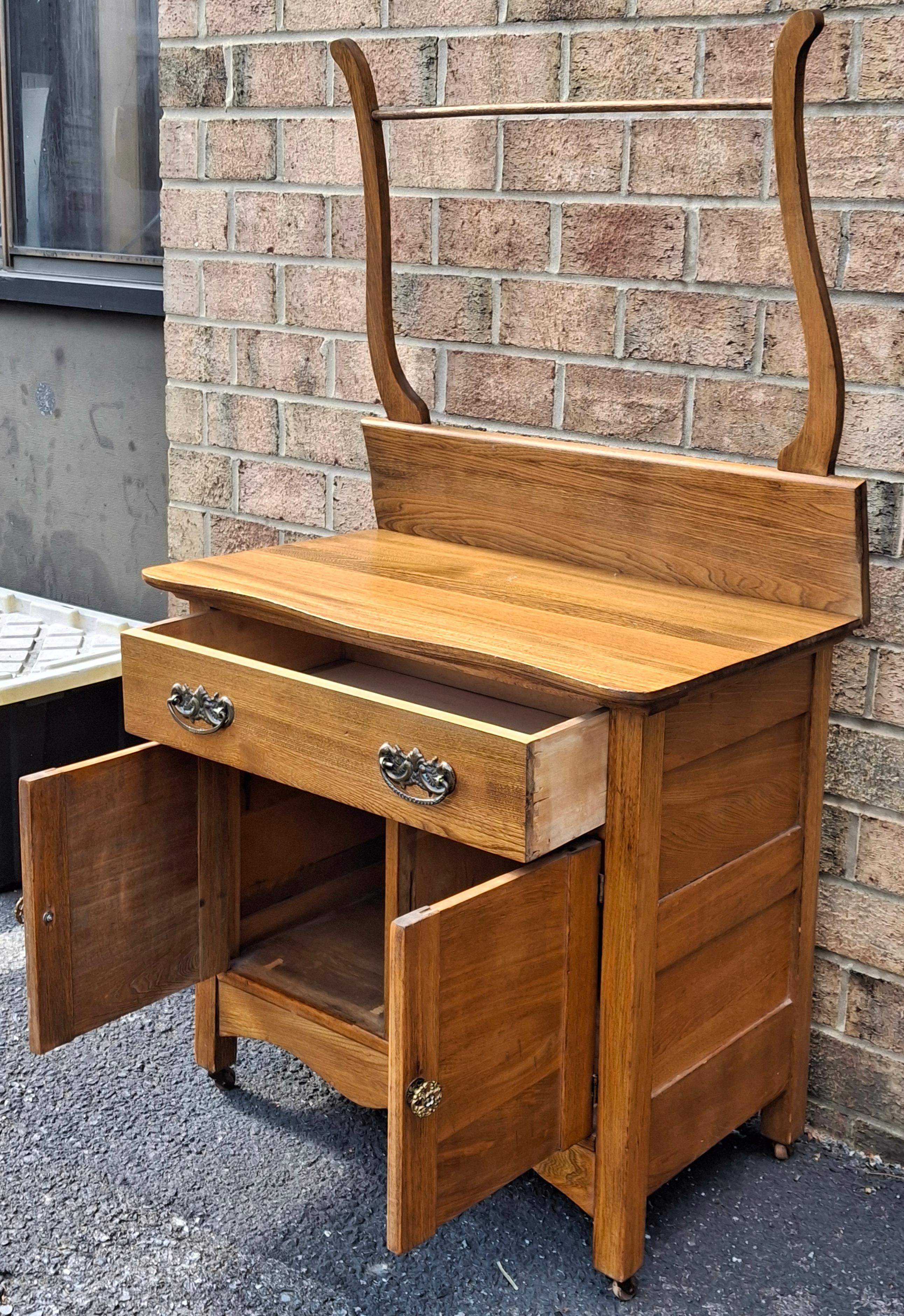 Stained Victorian Style Oak Washstand Cabinet with Towel Rack For Sale