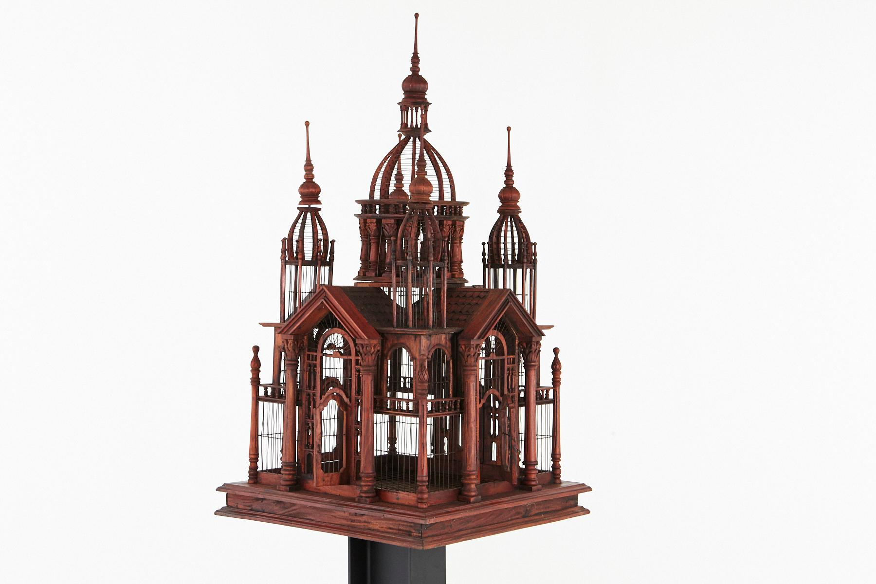 Beautiful large Victorian-style replica of a Raj Palace wire birdcage with an abundance of Victorian architectural details, doors, towers, a cupola, etc. 
The birdcage has never been used, there were never birds inside.
The birdcage is standing flat