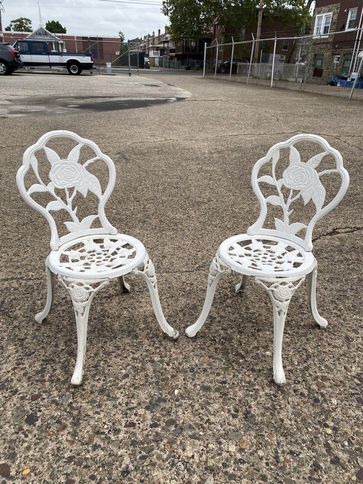 Victorian Style Rose Pattern Cast Aluminum Garden Patio Outdoor Bistro Chairs - a Pair. Circa 21st Century. Pre-owned. Measurements: 33.5