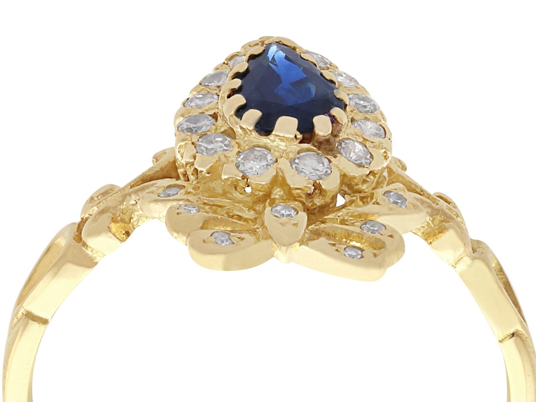 An impressive Victorian style vintage 0.45 carat sapphire and 0.20 carat diamond, 18 karat yellow gold cocktail ring; part of our diverse sapphire jewelry collections.

This fine and impressive Victorian style sapphire ring has been crafted in 18k