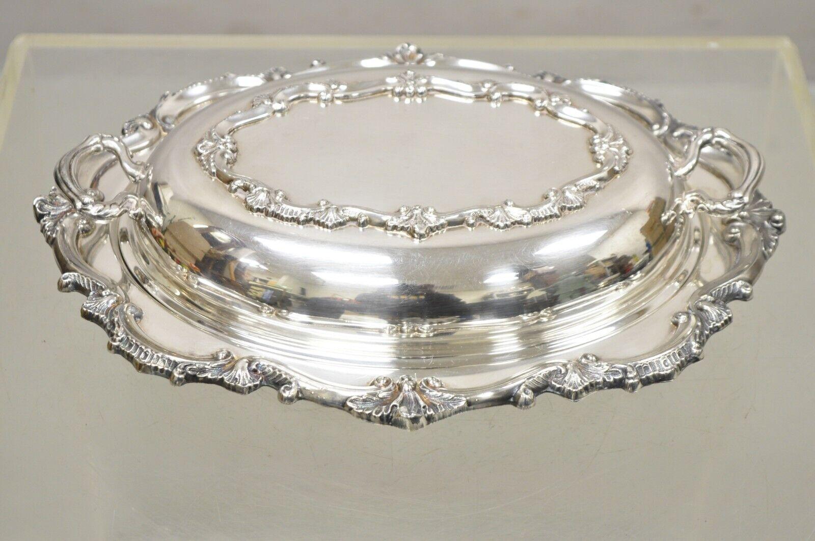 Vintage Victorian Style Silver Plated Lidded Ornate Serving Dish Bristol Silver by Poole. Item features ornate twin handles, fancy lid, original hallmark. circa Mid-20th century. Measurements: 3.5