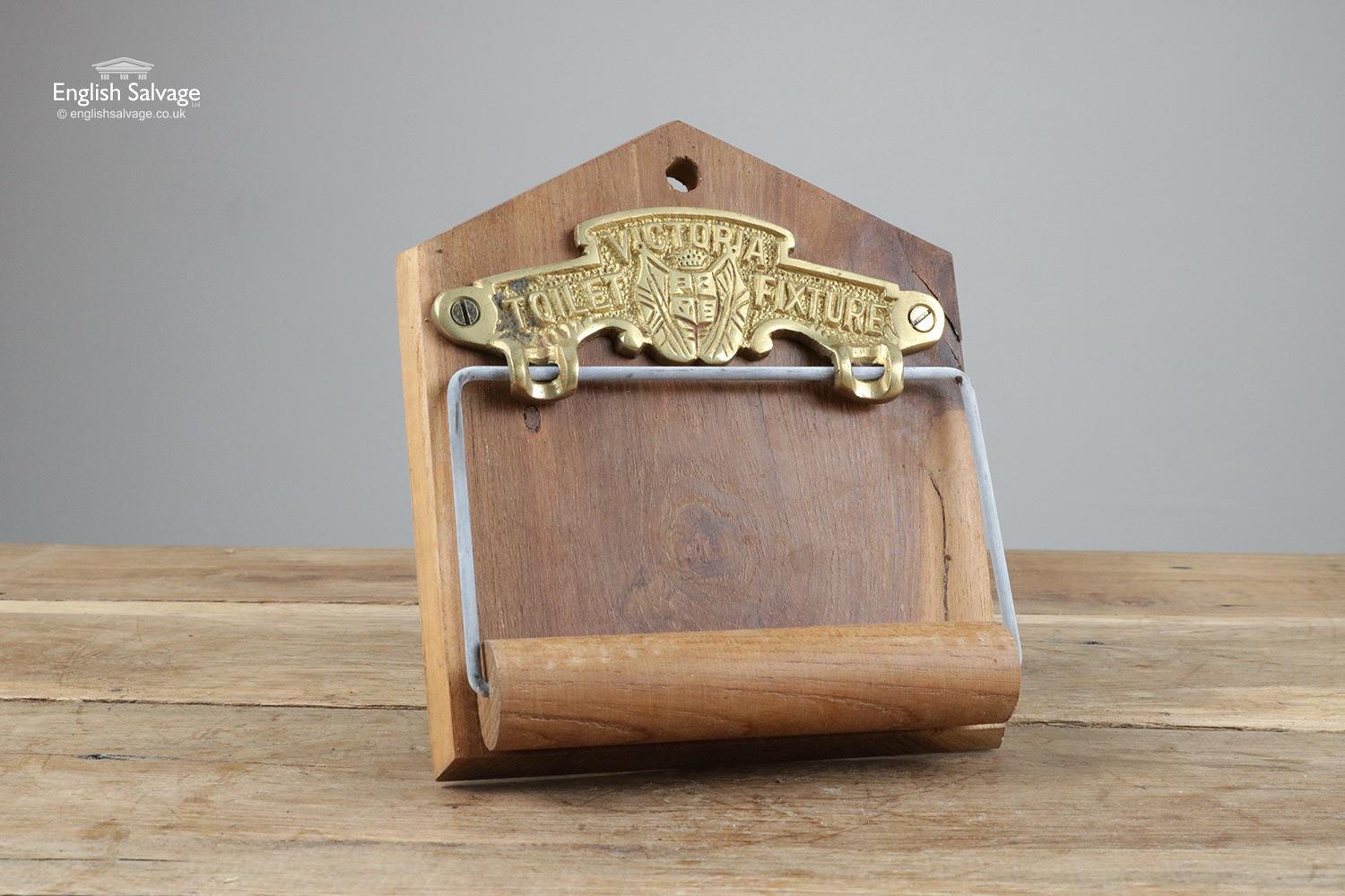 Traditional Victorian style loo roll holder in hardwood with an engraved solid brass plate. Fixing hole to the top. Measurements given are the maximum overall.