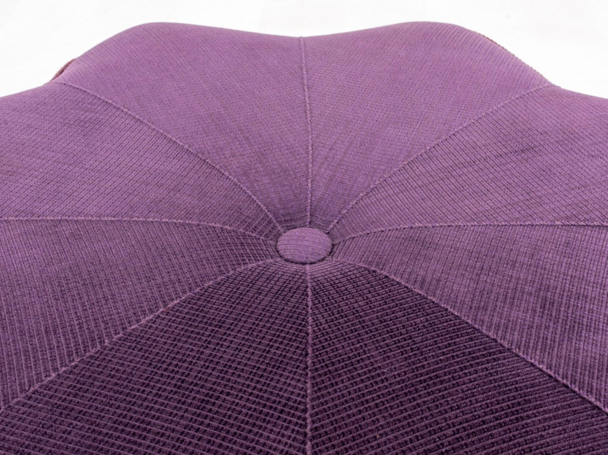 
The Victorian-inspired shaped floriform purple corduroy upholstered pouf or ottoman,

 has dimensions of approximately 16 inches in height and 36 inches in diameter.