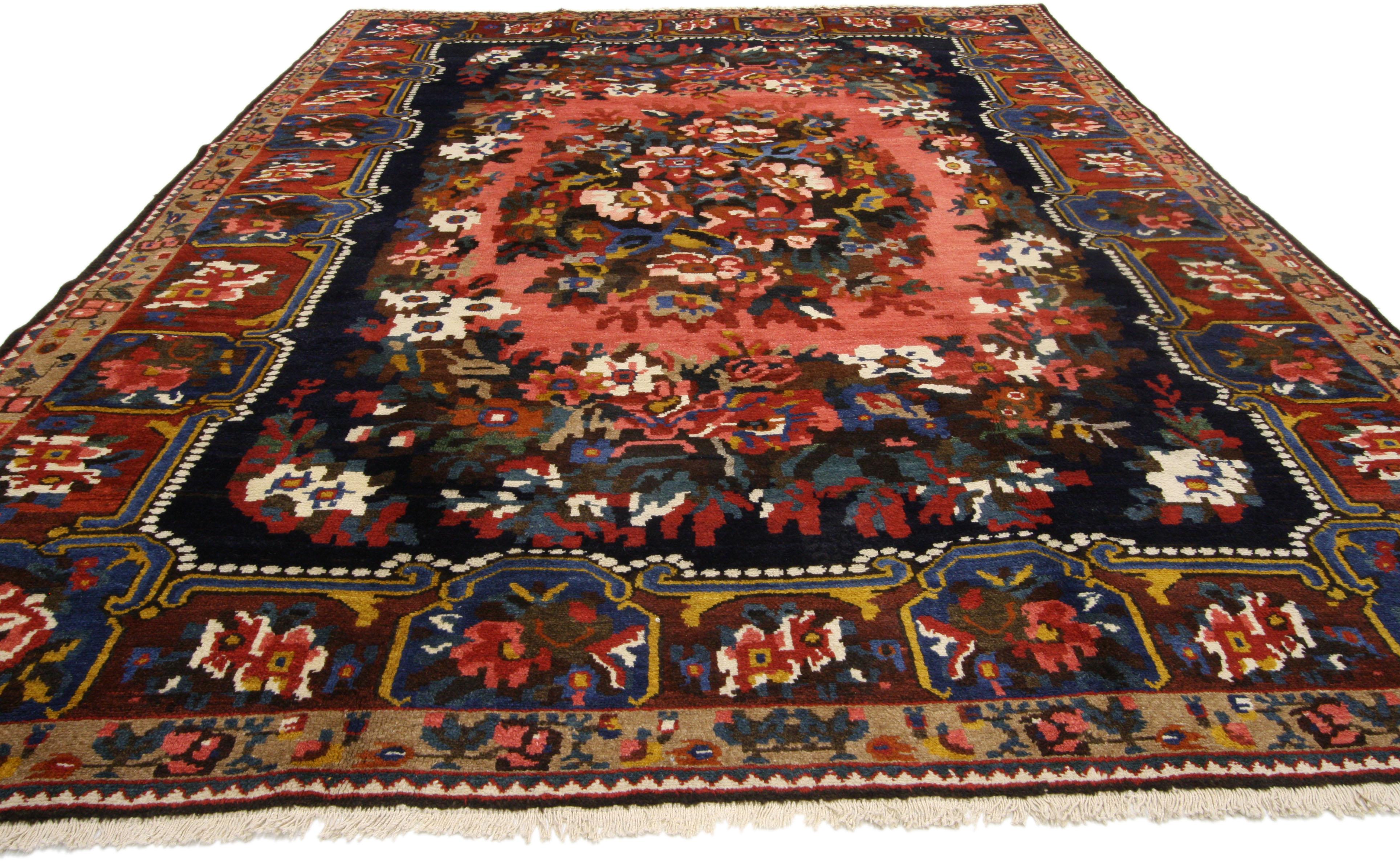 75358 Victorian style Vintage Persian Bakhtiari rug with Floral Design Pearl Border 07'03 x 09'09. This hand knotted wool vintage Persian  Bibibaff Bakhtiari rug with Victorian style features a joyful burst of color in an abundance of blossoming