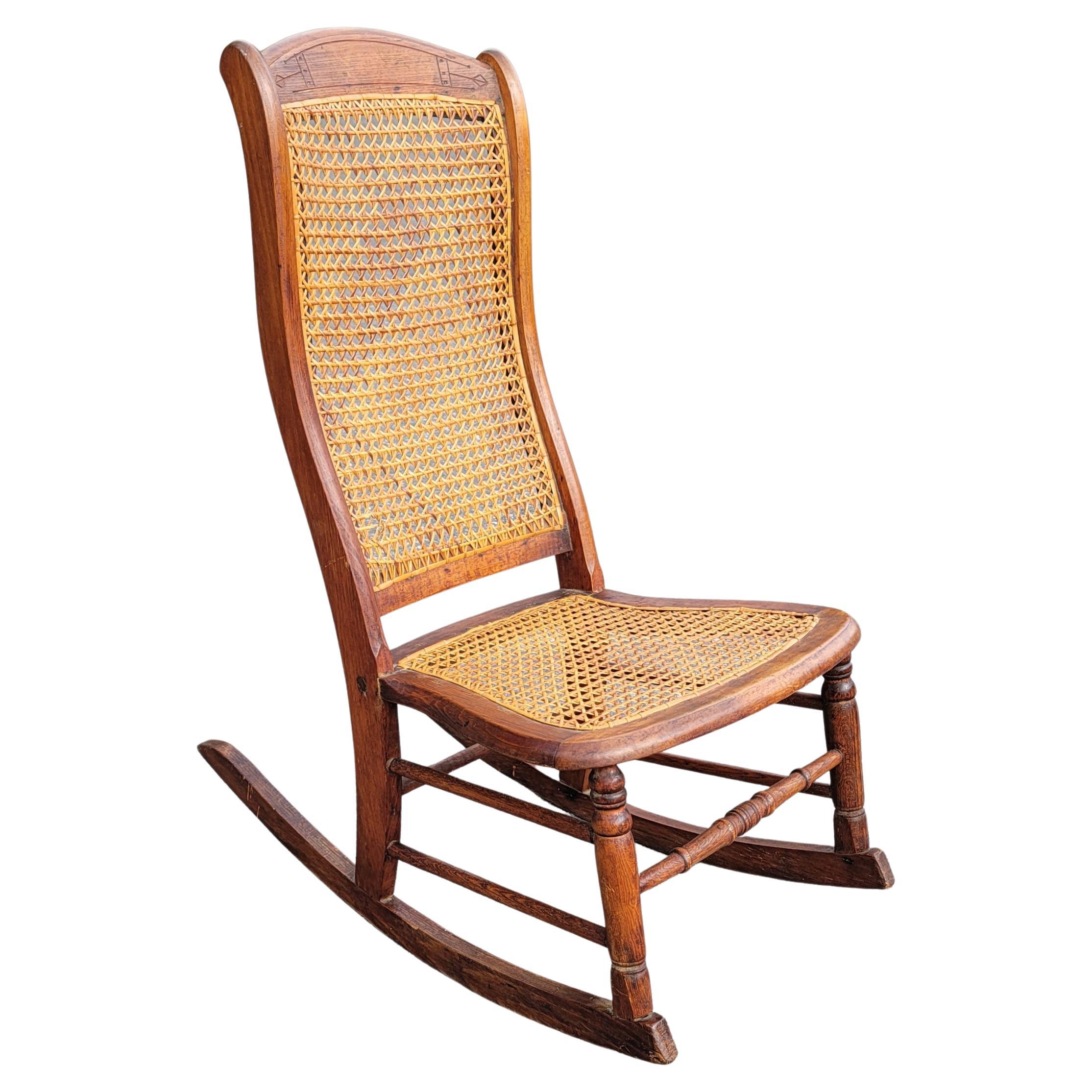 Antique rocking chair with cane seat and back hotsell
