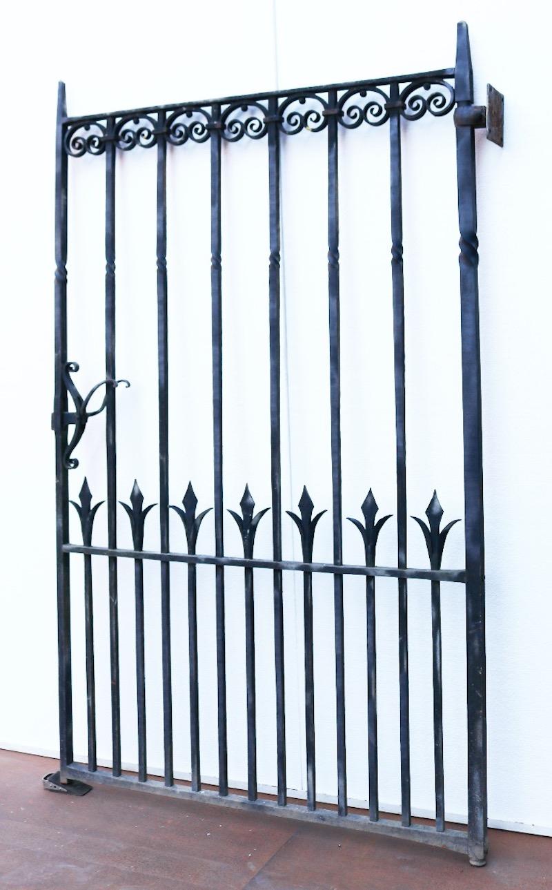 An attractive reclaimed, wrought iron pedestrian gate. Made in the traditional style with decorative scrollwork.

We don’t usually offer fairly modern items, this gate is however made entirely traditionally, using fire welding.

Stamped ‘Richard