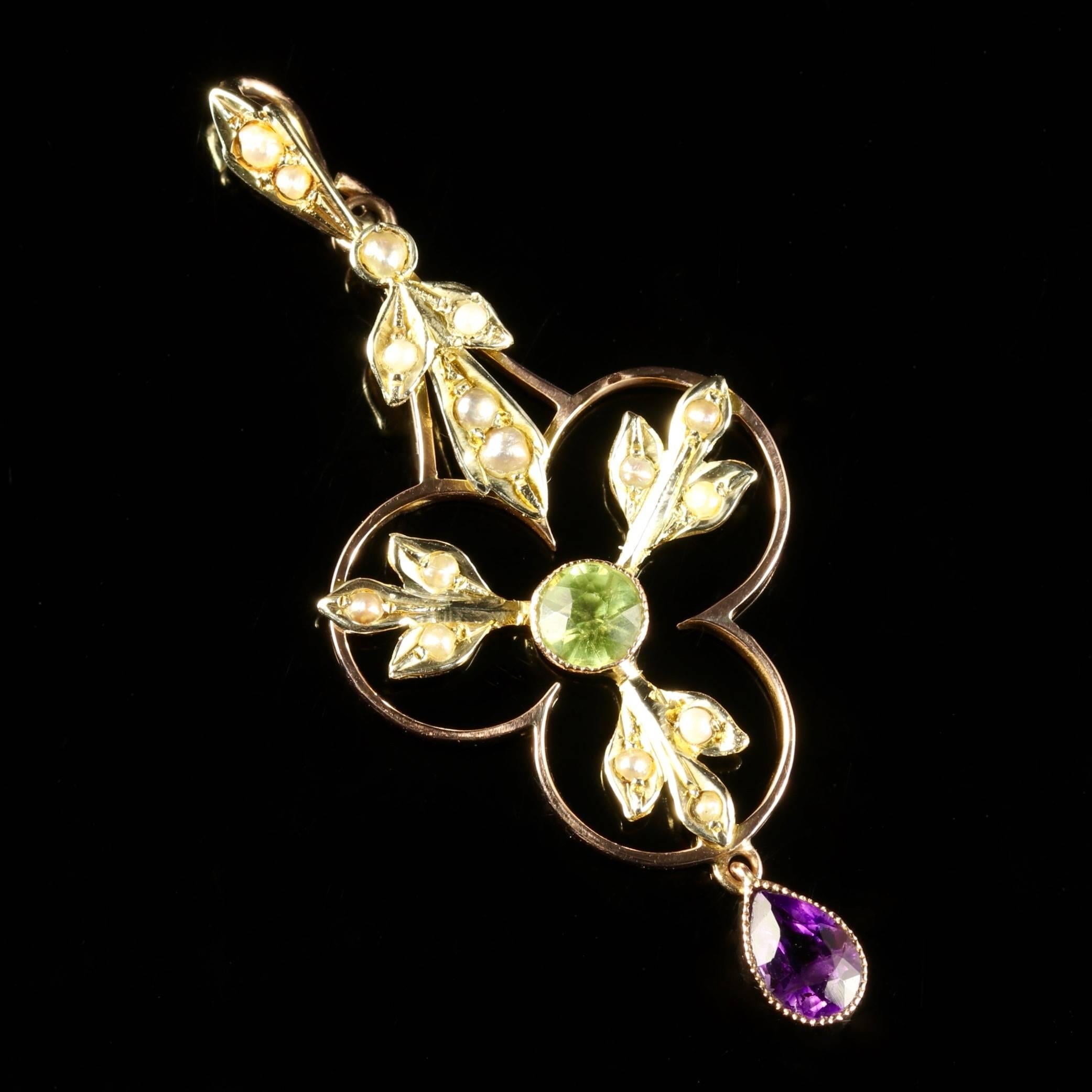 This charming 9ct Yellow Gold Suffragette pendant is Victorian, Circa 1900. 

The beautiful pendant is adorned with a central Peridot, an Amethyst dropper and finishing with lustrous Pearls. 

Suffragettes liked to be depicted as feminine, their