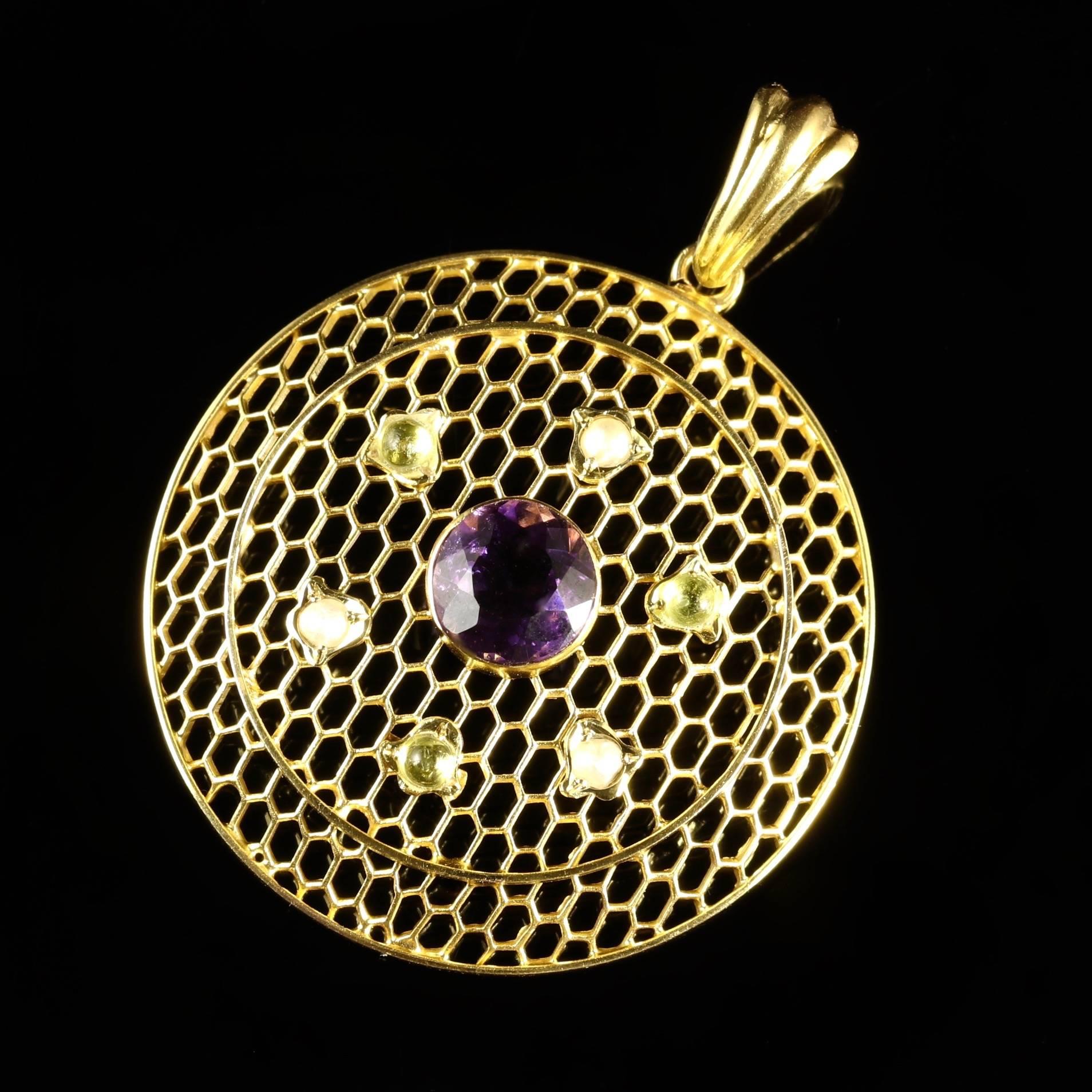 This fabulous Victorian 9ct Gold pendant is Circa 1900. 

The wonderful round pendant has a bright 1.75ct Amethyst in the centre, which is surrounded by Peridots and Pearls.

Emmeline Pankhurst was the leader of the British Suffragette movement in