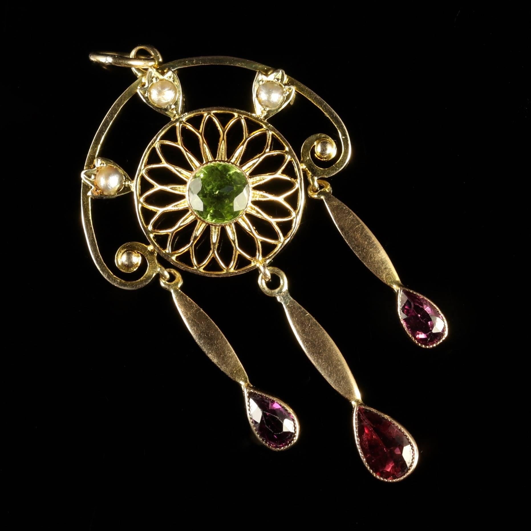 This genuine Victorian Suffragette pendant set in 9ct Gold, Circa 1900.

The wonderful pendant is decorated in creamy Pearls and adorned with a 0.60ct Peridot in the centre, finishing with three fabulous Amethyst pendant droppers.

Emmeline