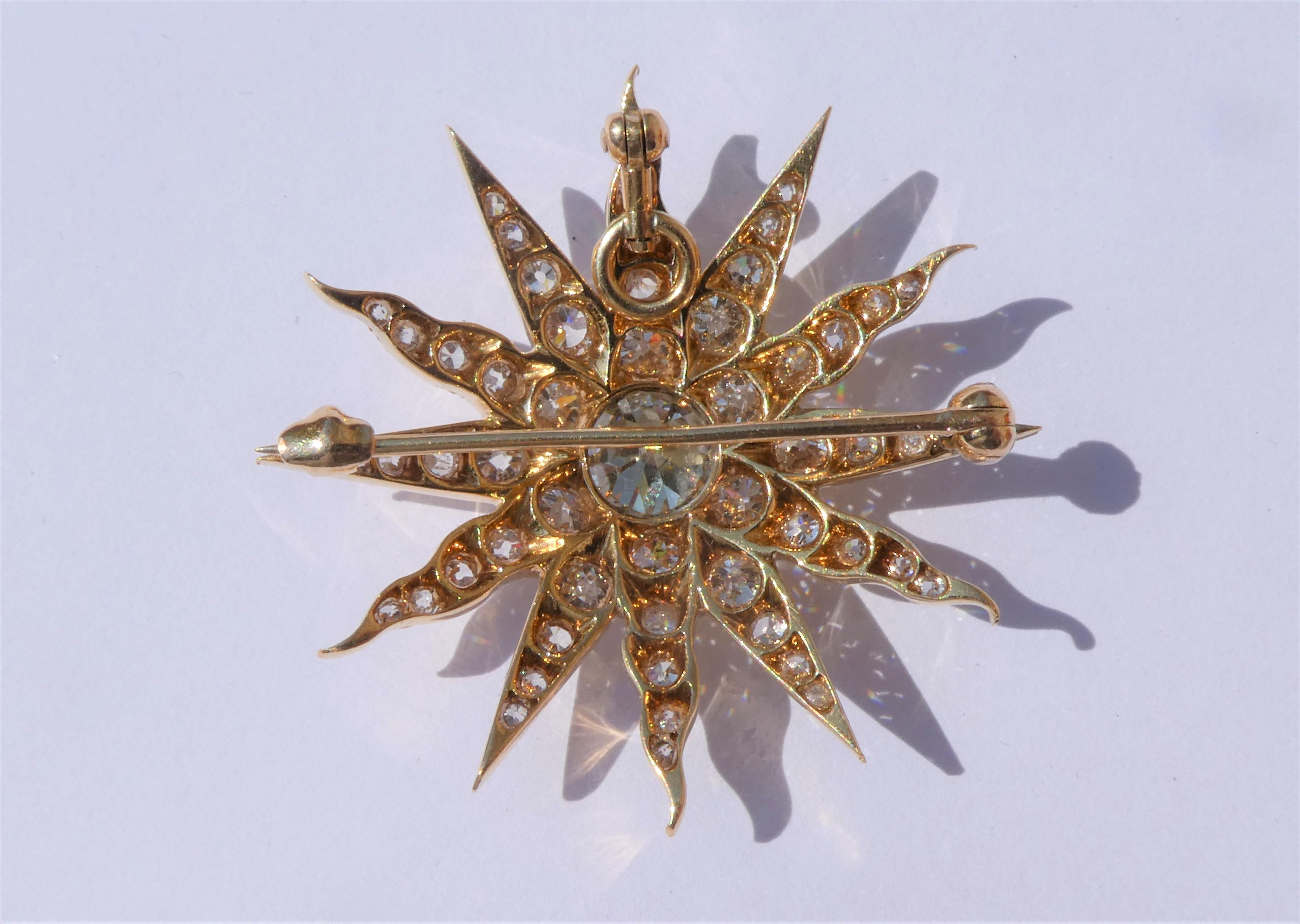 Old Mine Cut Victorian Twelve-Rayed Star Sunburst Gold Diamond Brooch Pendant For Sale